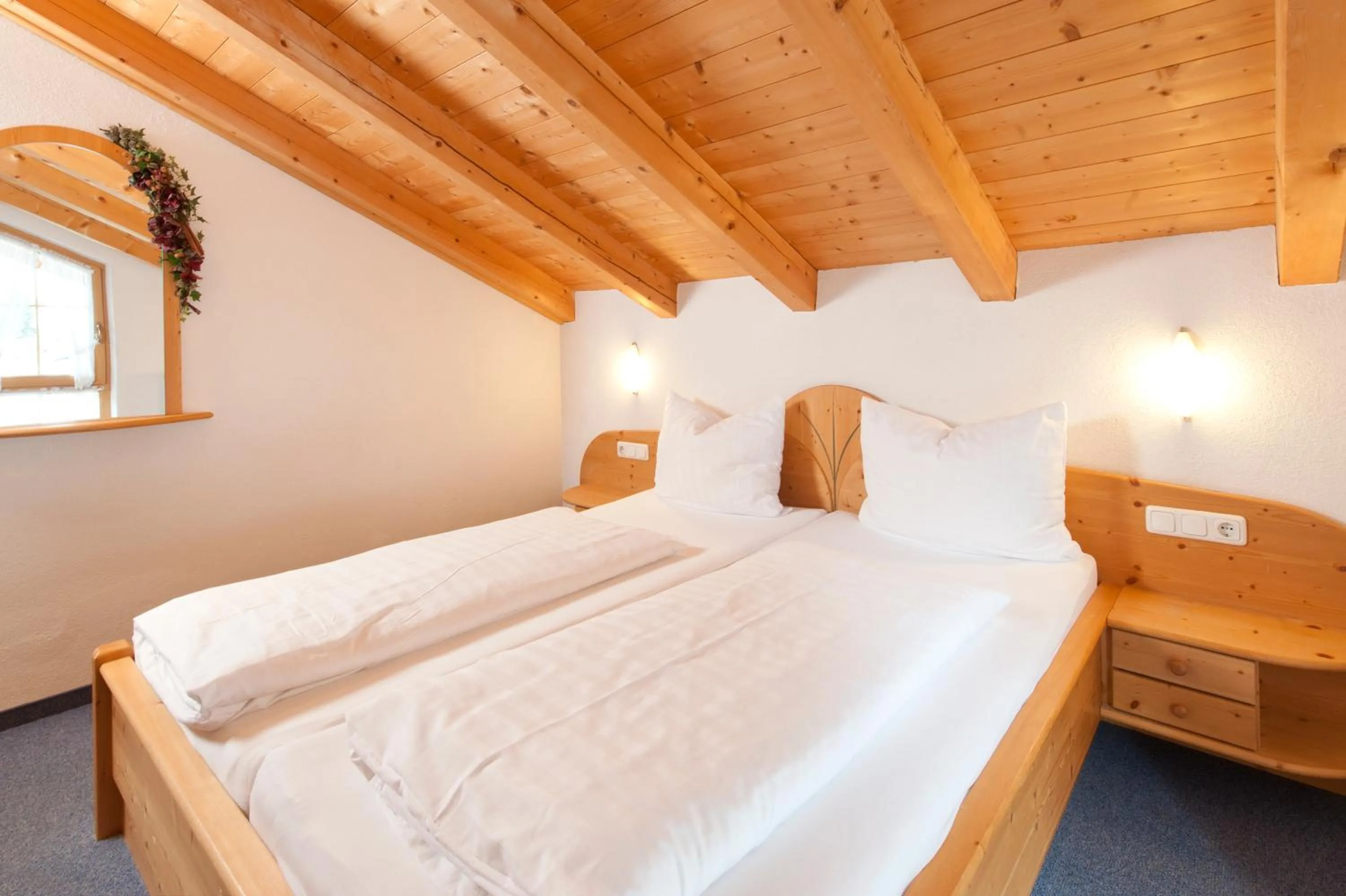 Bedroom, Bed in Mallaun Hotel.Erlebnis