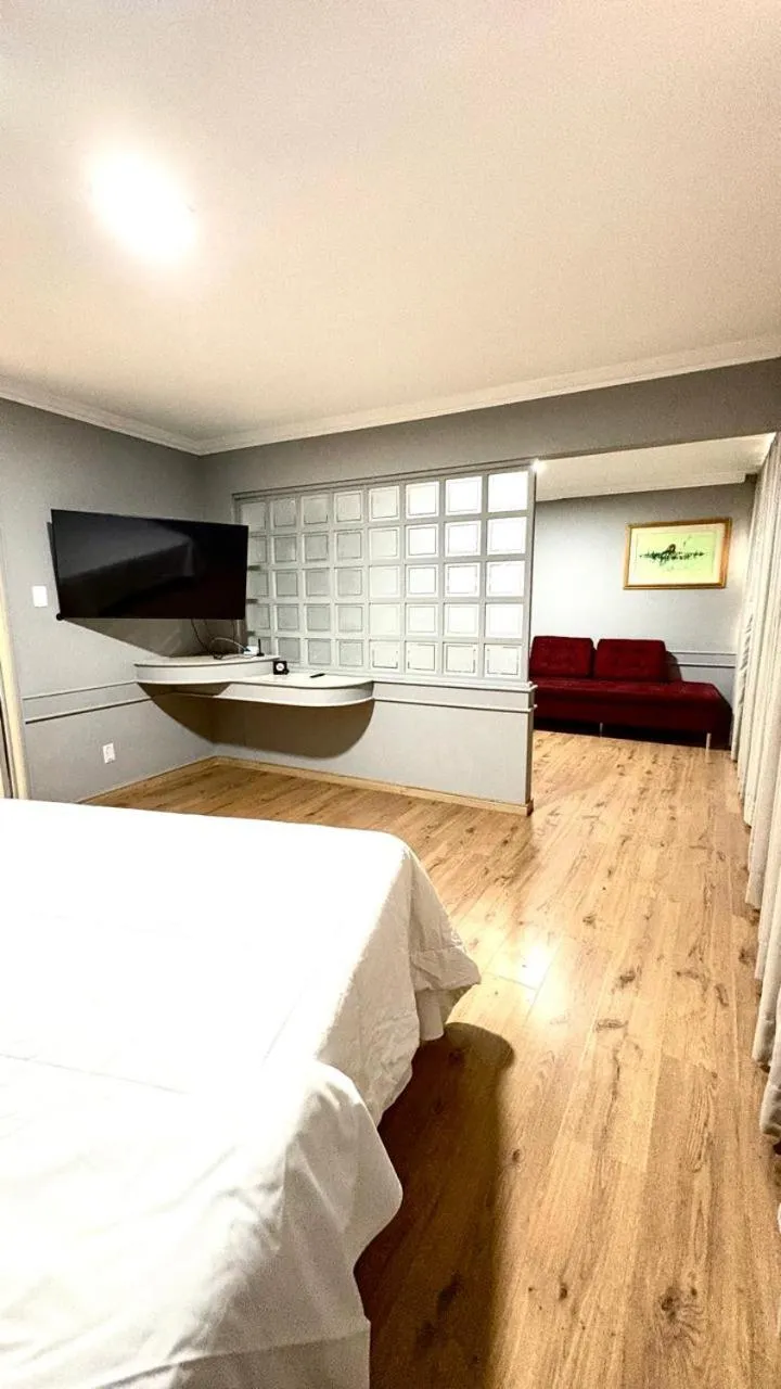 Bed in HOTEL DEL REY CURITIBA by POTY - NA FAMOSA RUA XV DE NOVEMBRO