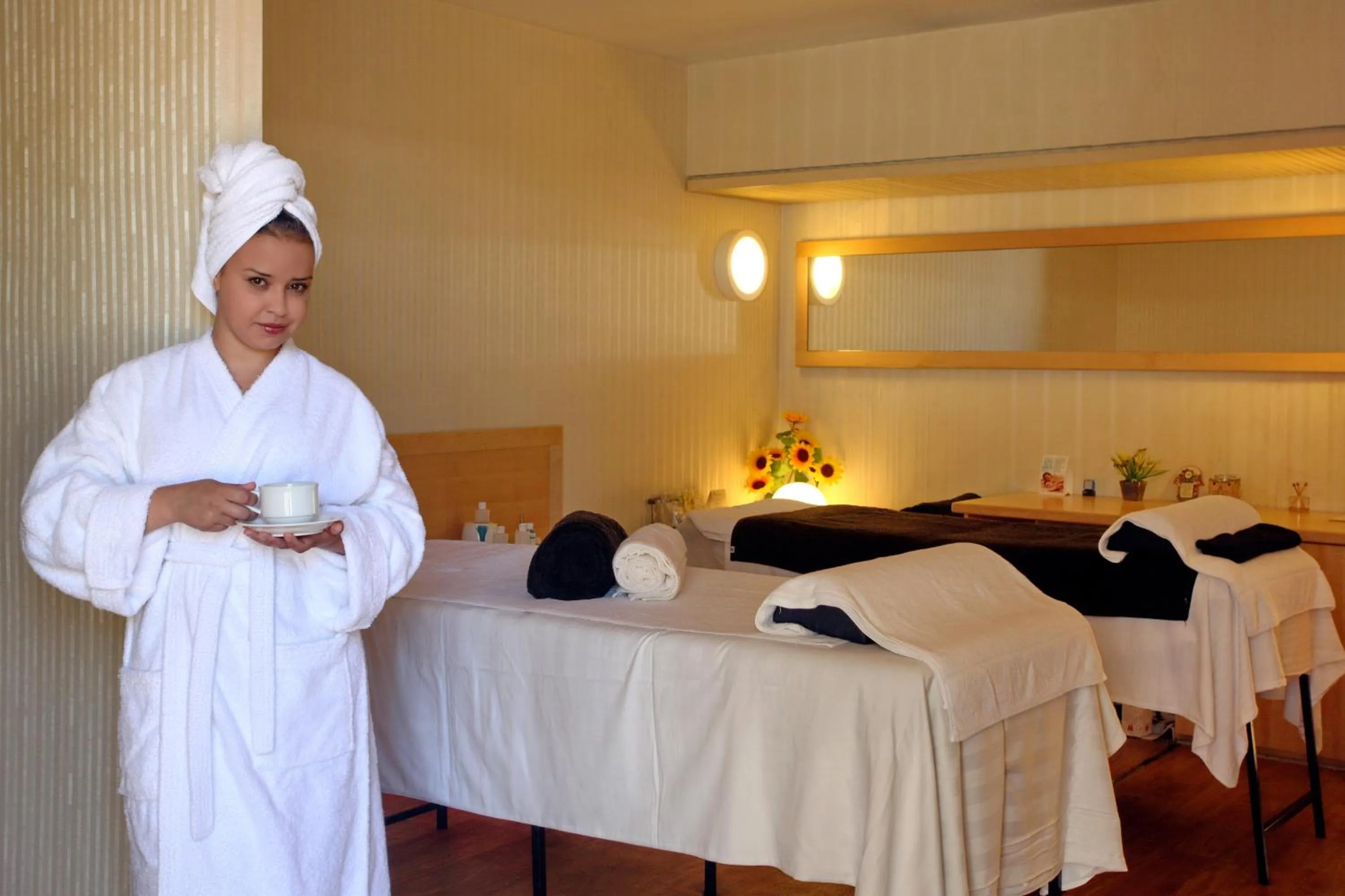 Massage in The Seasons Hotel -Studio & Suite