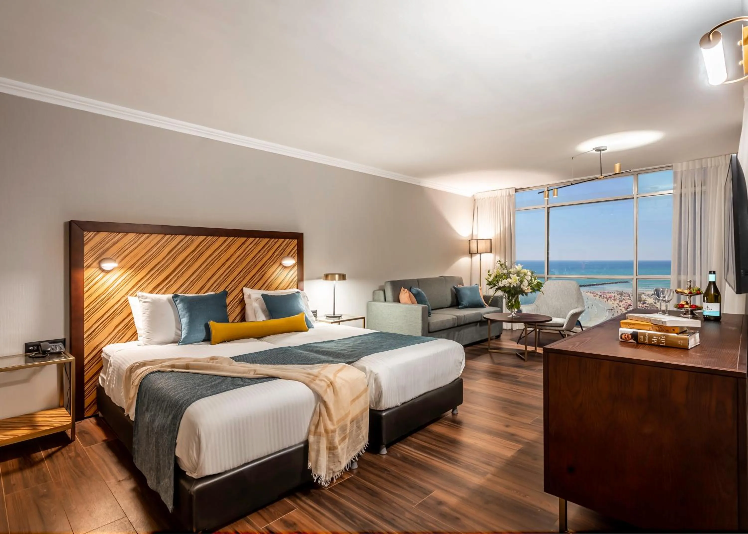 Bed in The Seasons Hotel -Studio & Suite