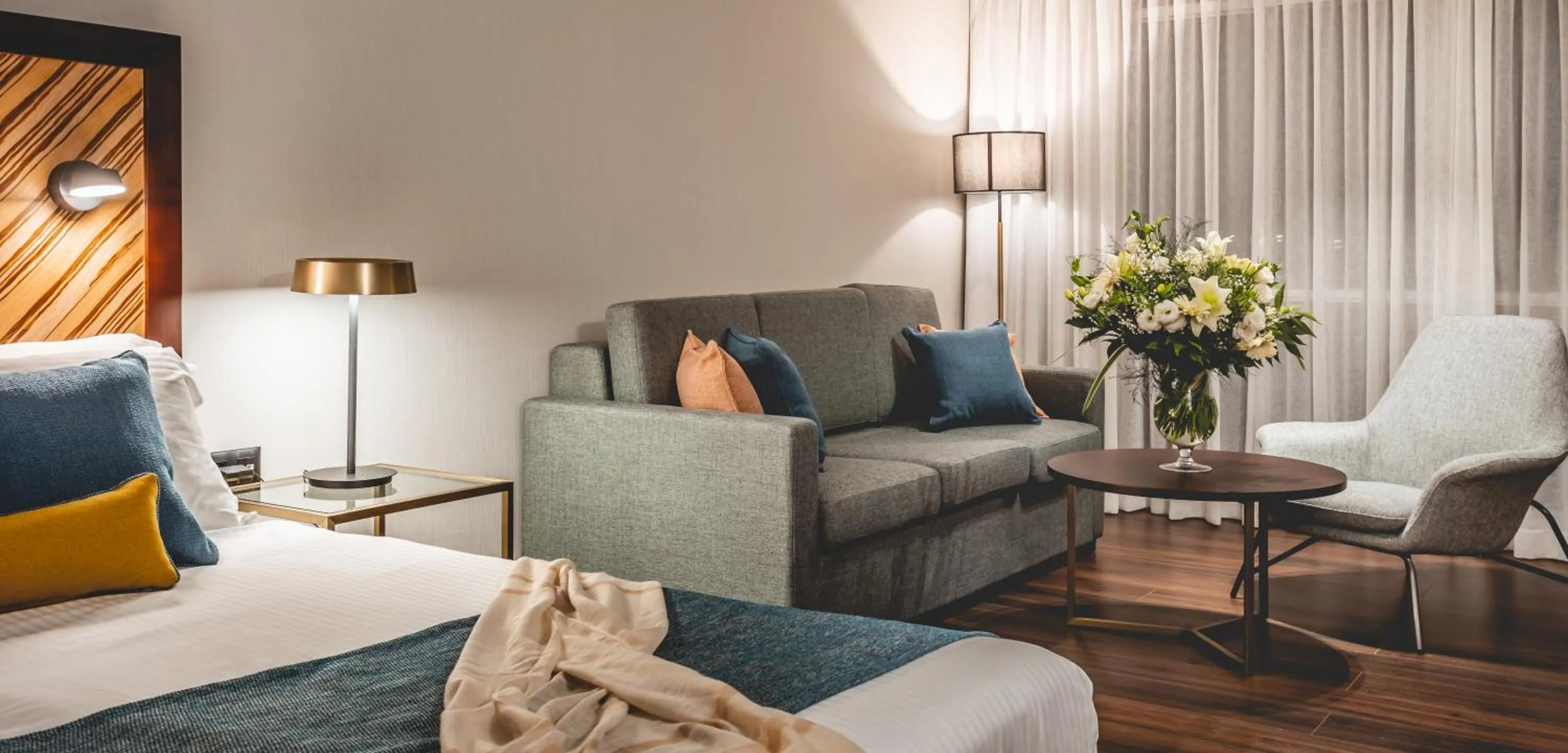 Bed in The Seasons Hotel -Studio & Suite