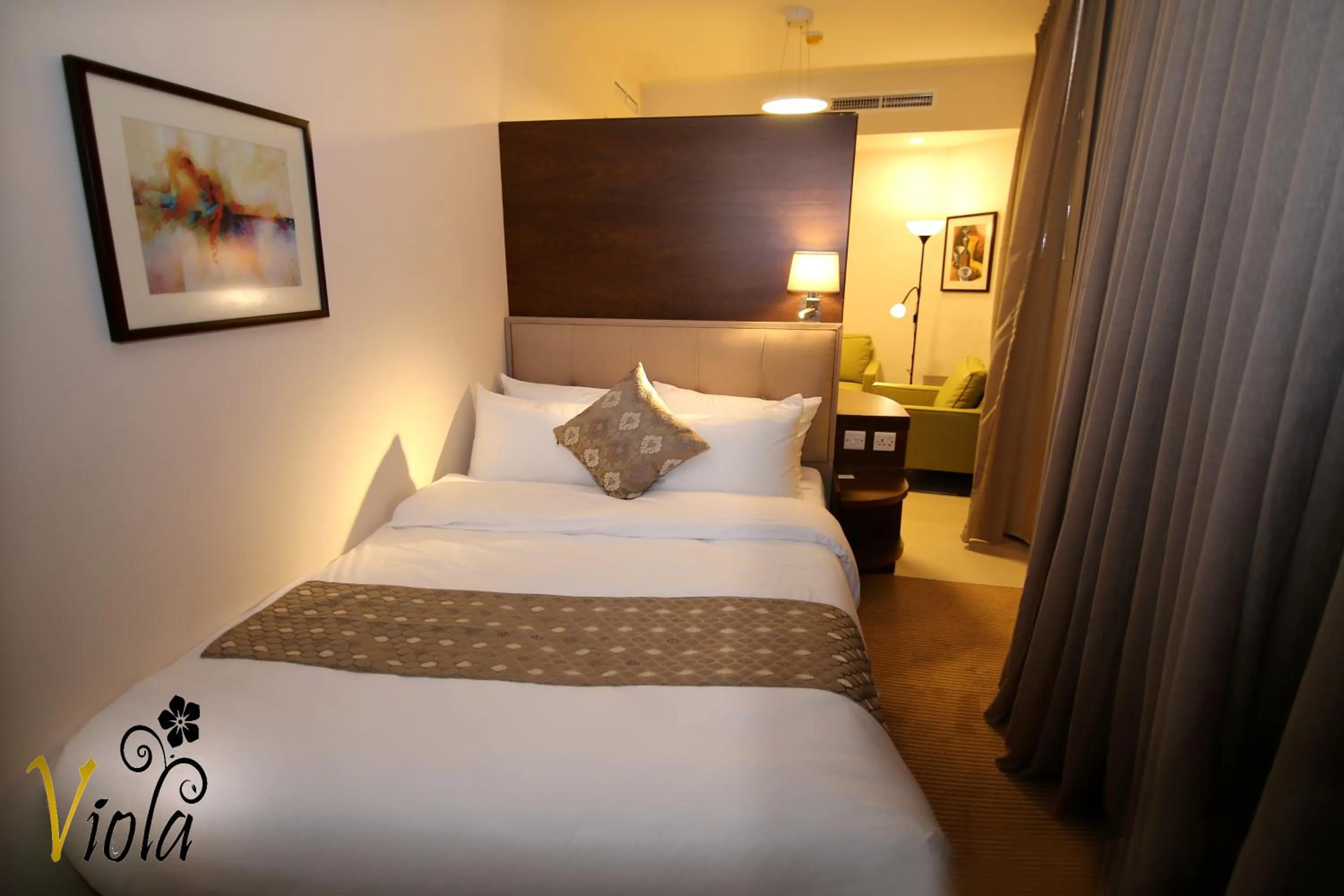 Bed in Viola Hotel Suites