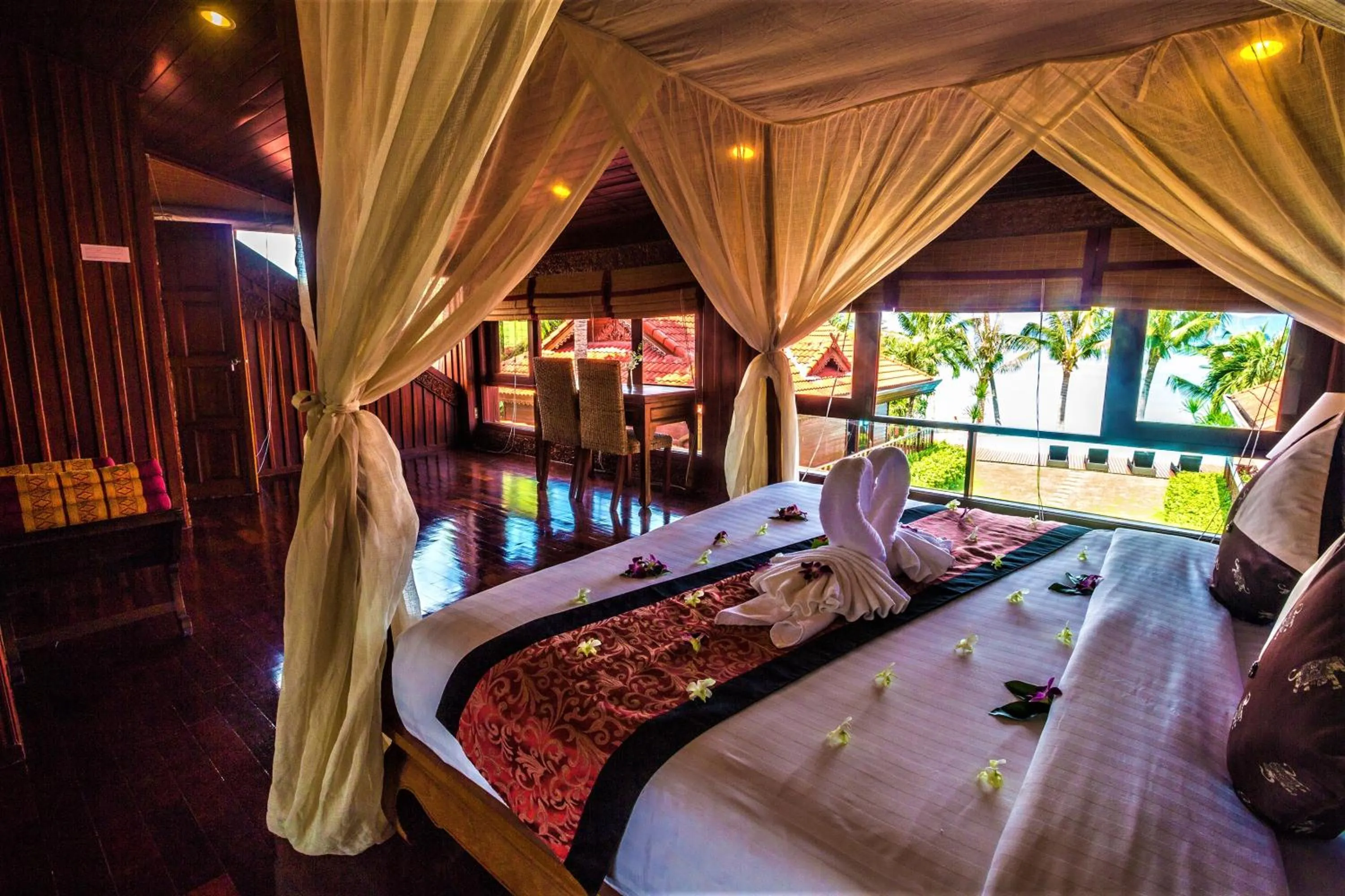 Bed in Erawan Villa Hotel