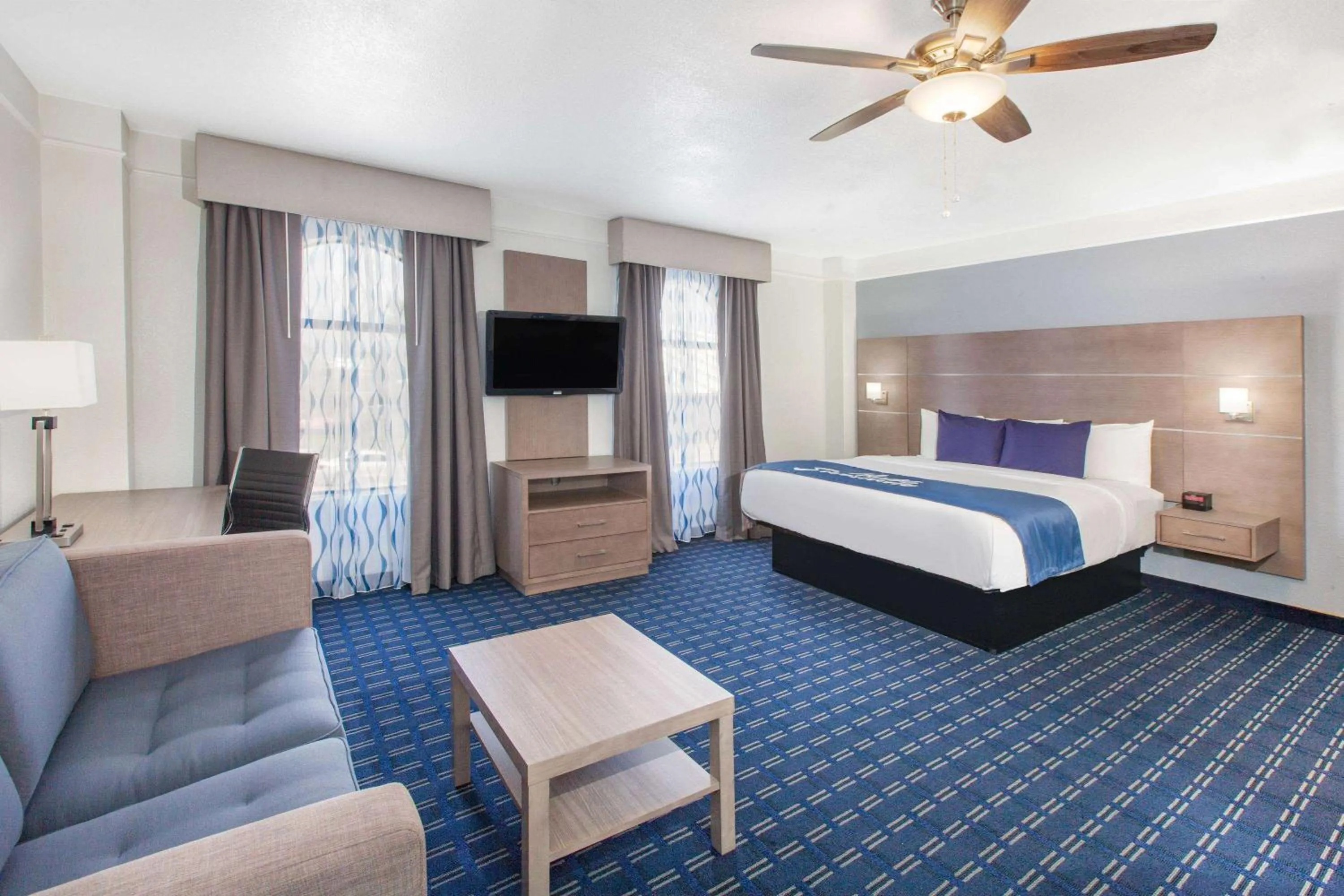 Photo of the whole room, Bed in Days Inn & Suites by Wyndham Webster NASA-ClearLake-Houston
