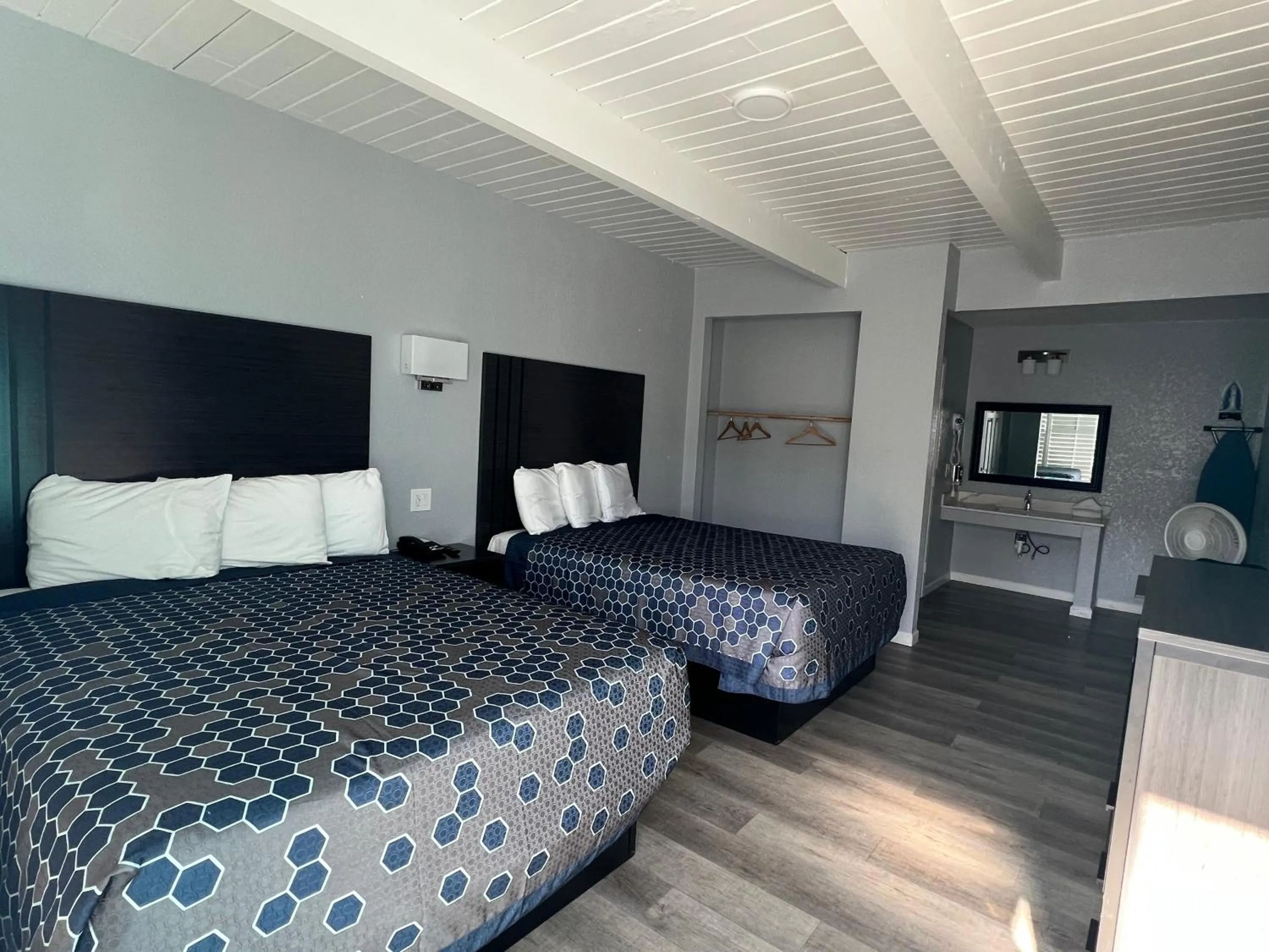 Bed in Sea Garden Inn