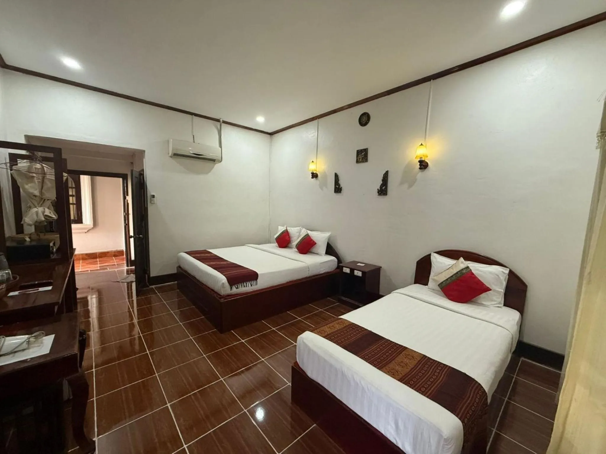 Photo of the whole room, Bed in Vangsavath Hotel