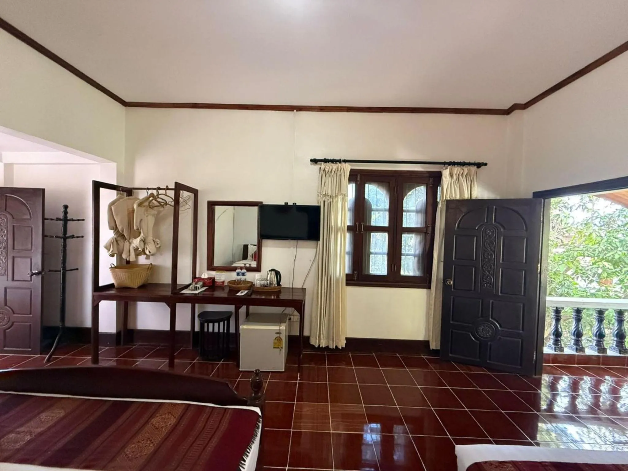 Communal lounge/ TV room in Vangsavath Hotel