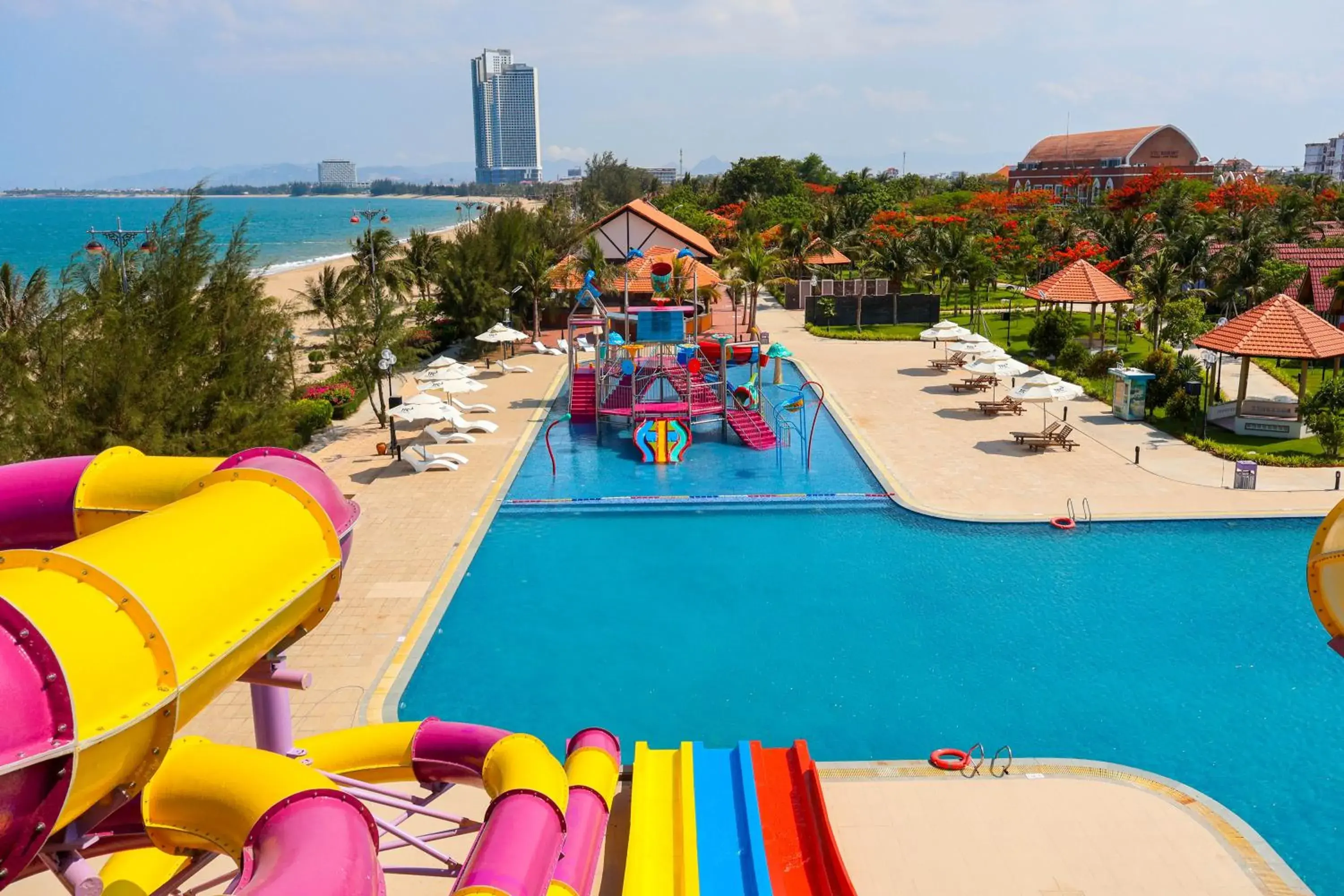 Swimming pool in TTC Resort Ninh Thuan - Unlimited Access to Water Park Swimming pool in TTC Resort Ninh Thuan - Unlimited Access to Water Park