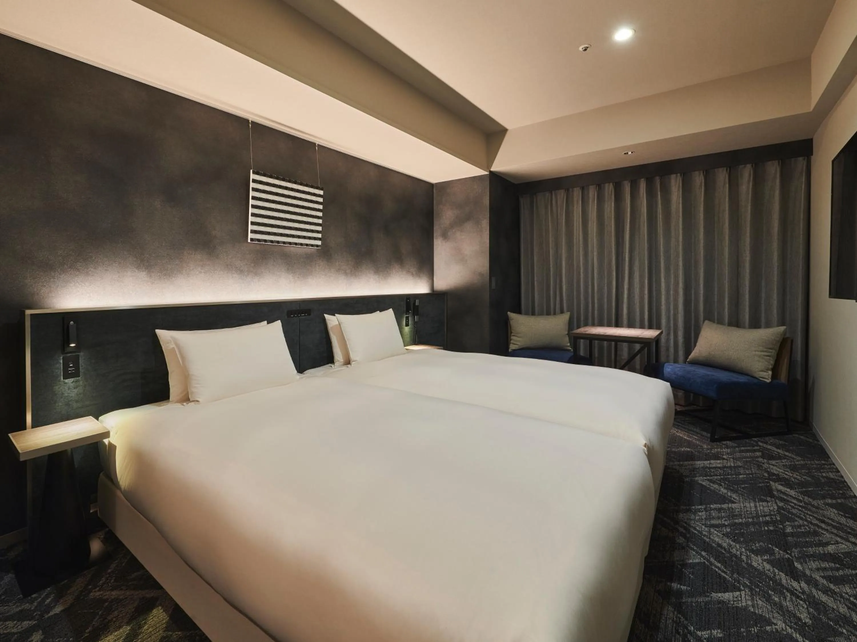 Bed in Cross Hotel Sapporo