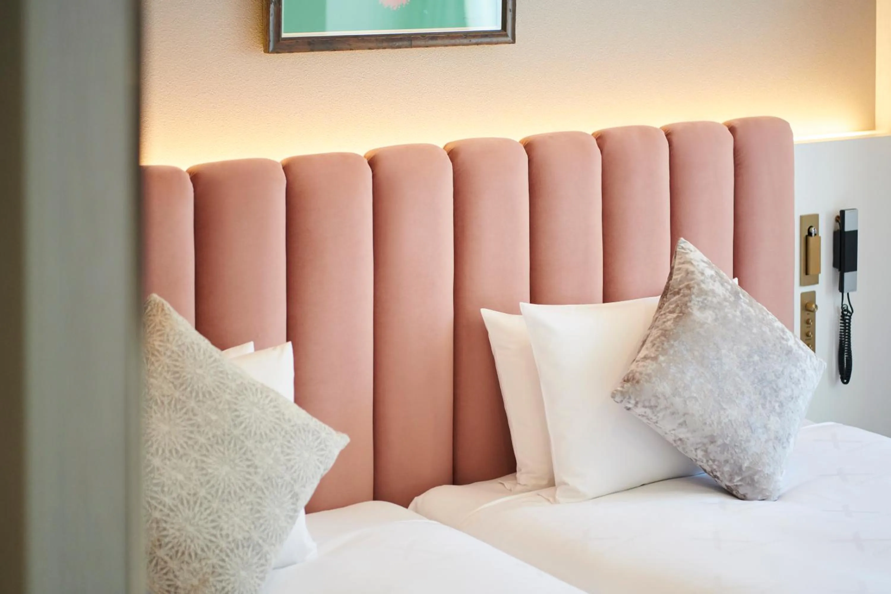 Bed in Cross Hotel Sapporo