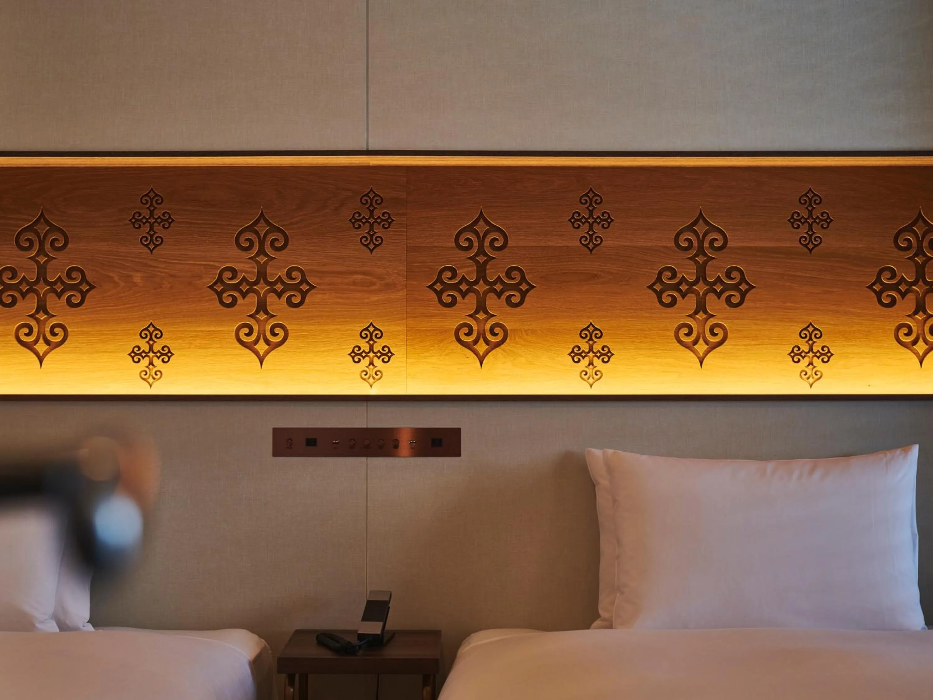 Bed in Cross Hotel Sapporo