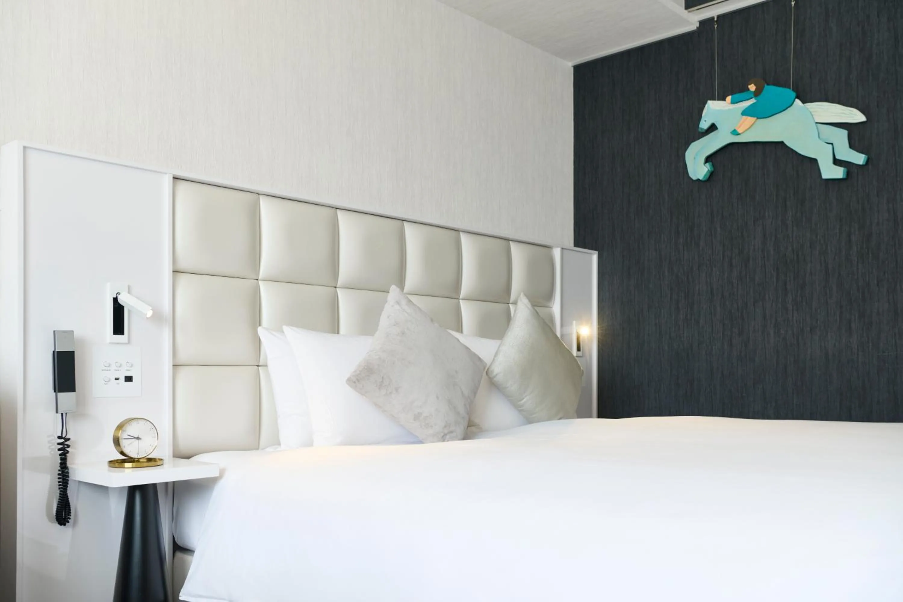 Bed in Cross Hotel Sapporo