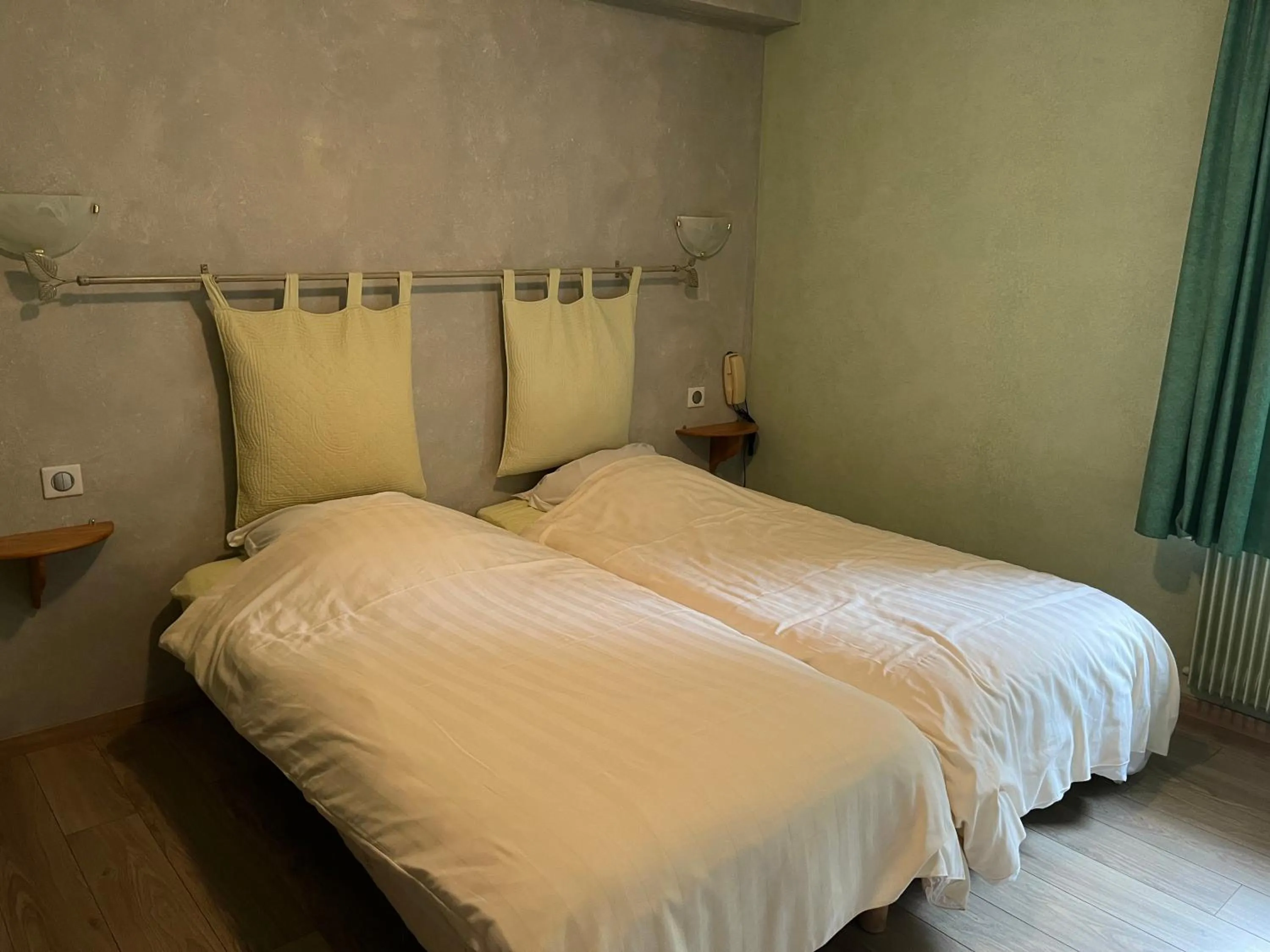 Bed in Logis Hotel & Restaurant - Les Vosges