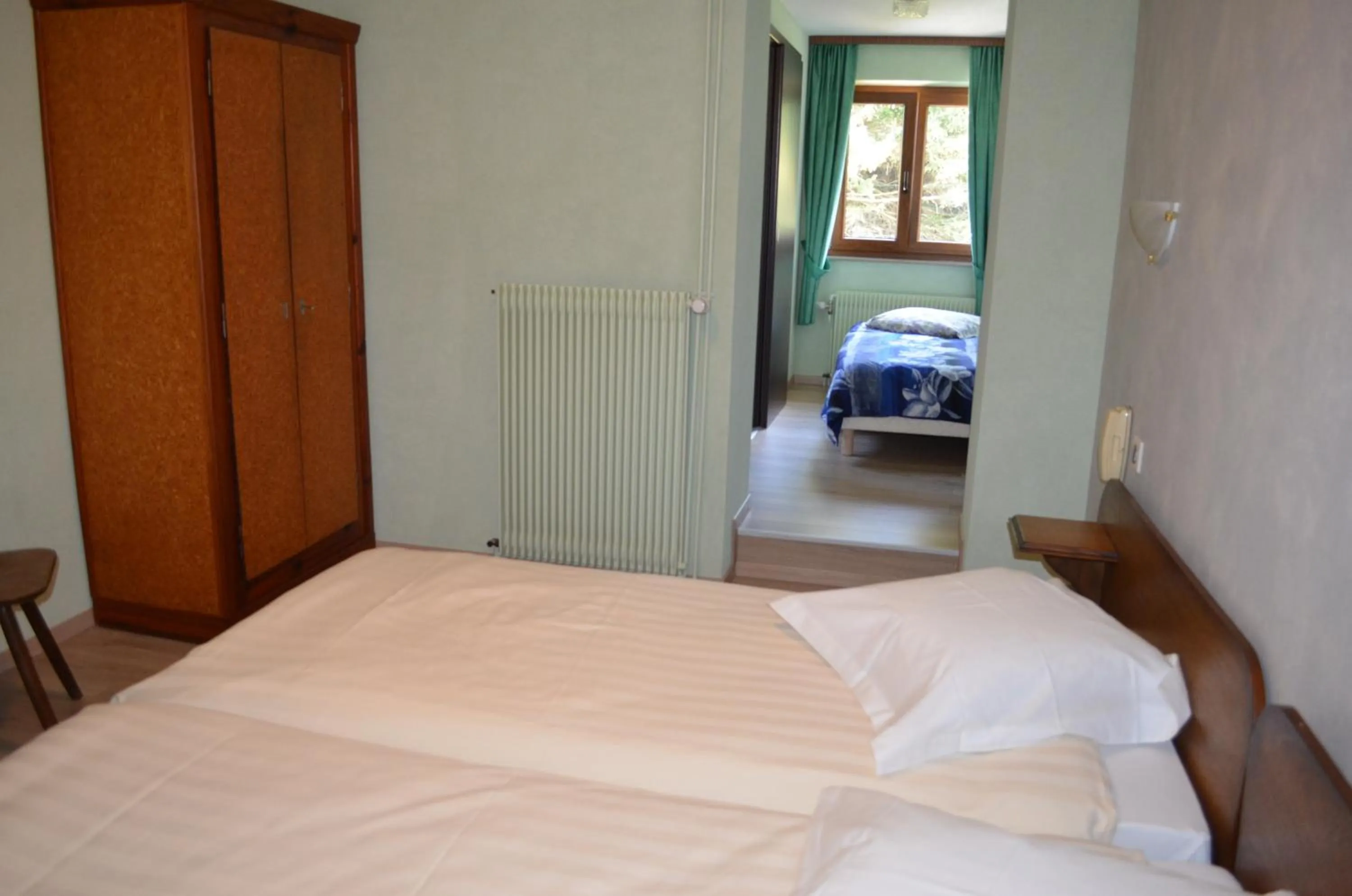 Bed in Logis Hotel & Restaurant - Les Vosges