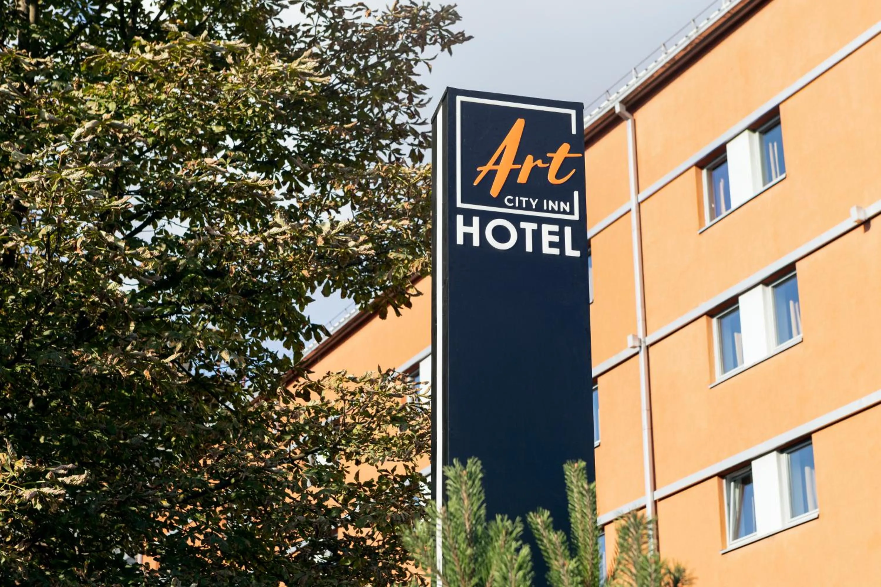 Property logo or sign in Art City Inn