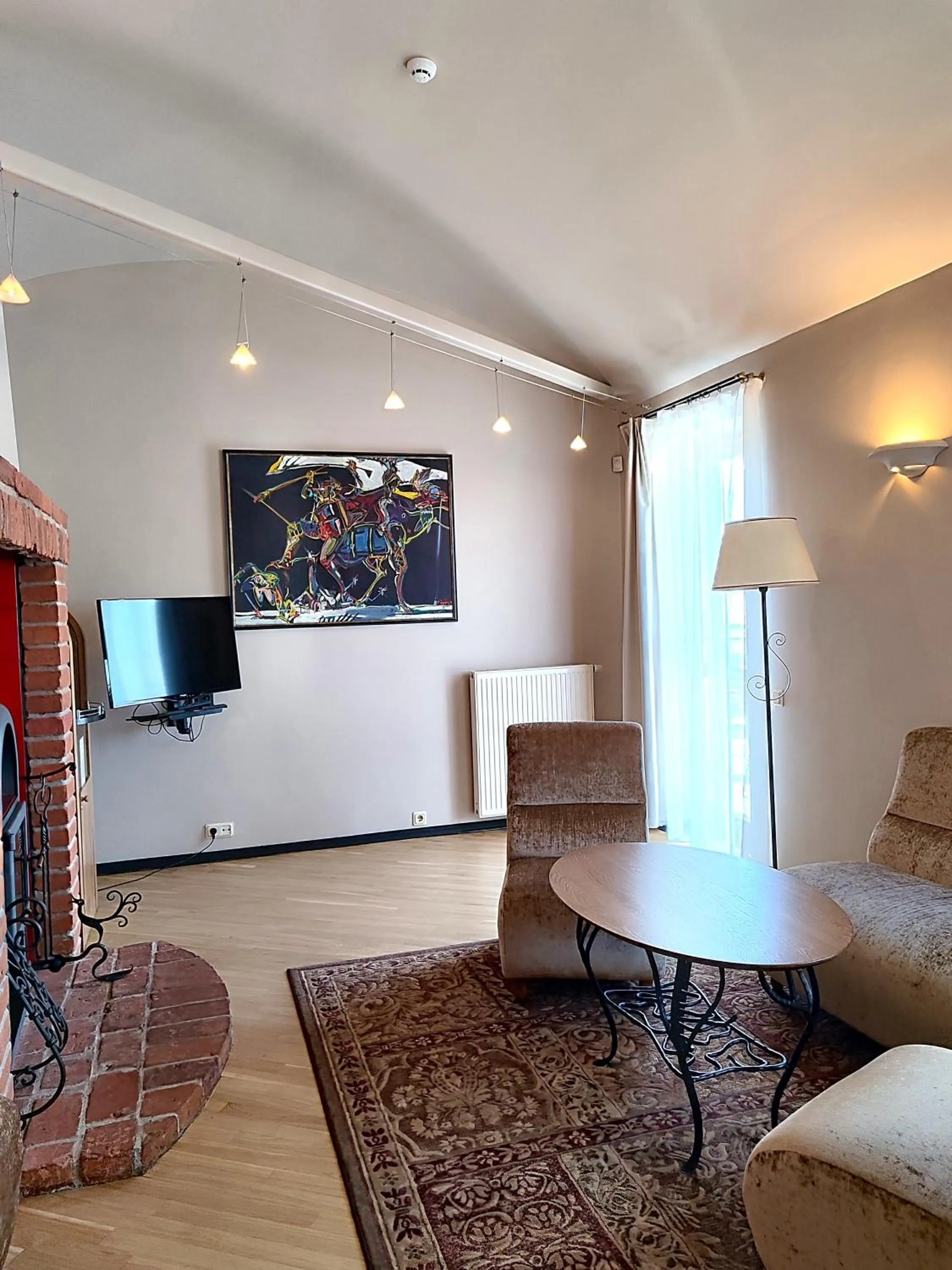 Communal lounge/ TV room in BEST WESTERN Santakos Hotel