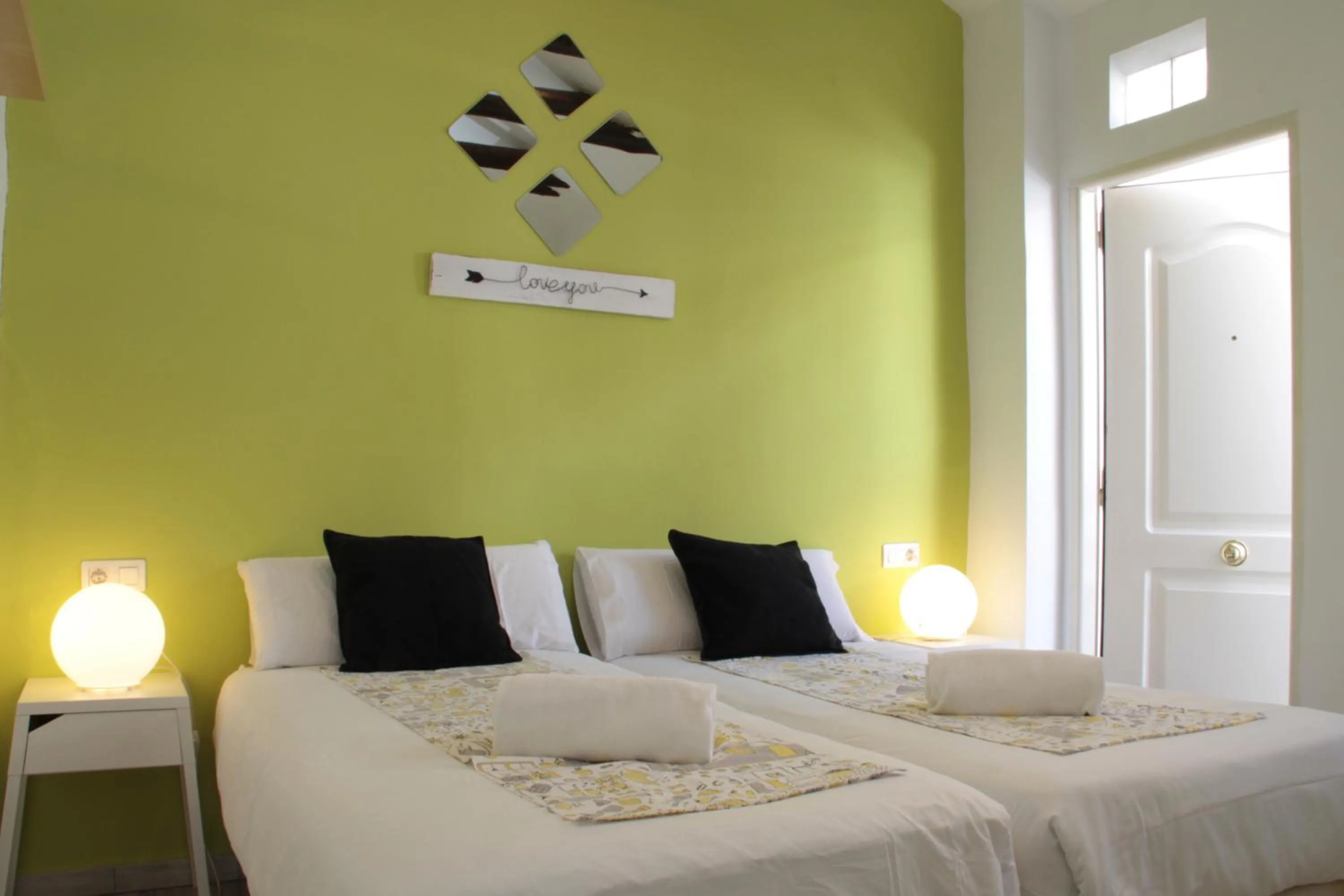 Bedroom, Bed in Apartamentos Inside Paseo de los Tristes