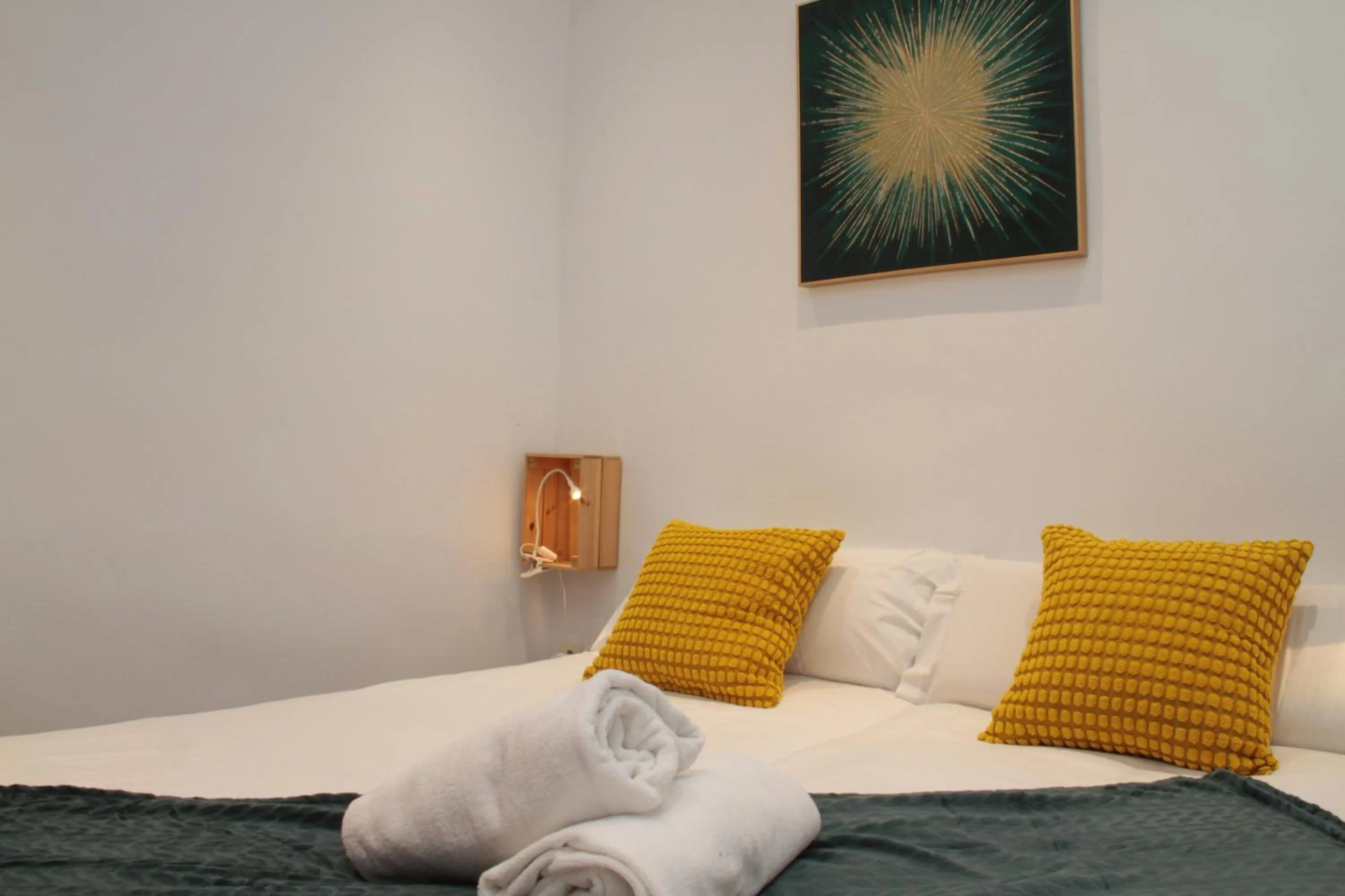 Bed in Apartamentos Inside Paseo de los Tristes