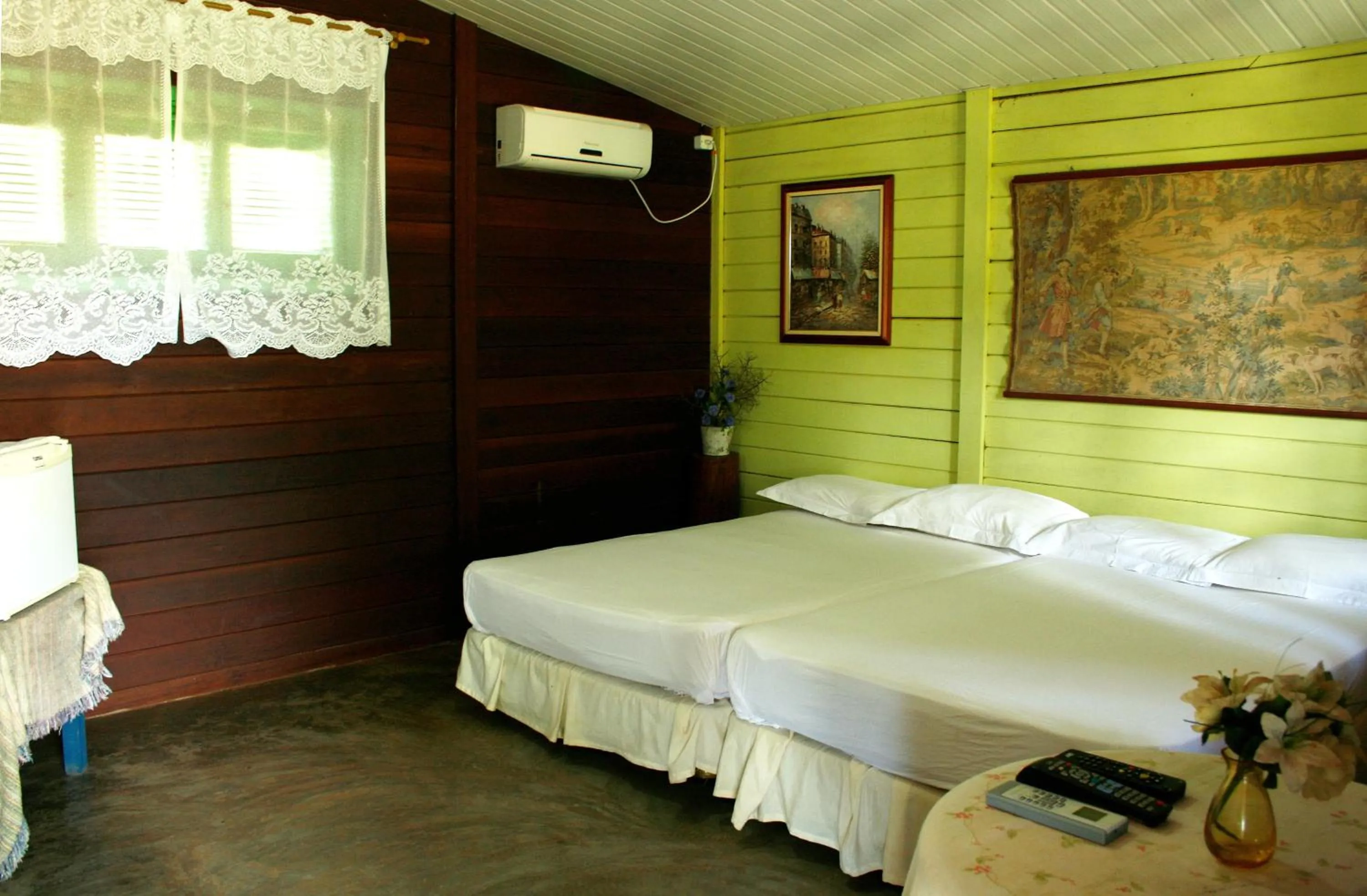 Bed in Pousada Cultural Canto dos Poetas