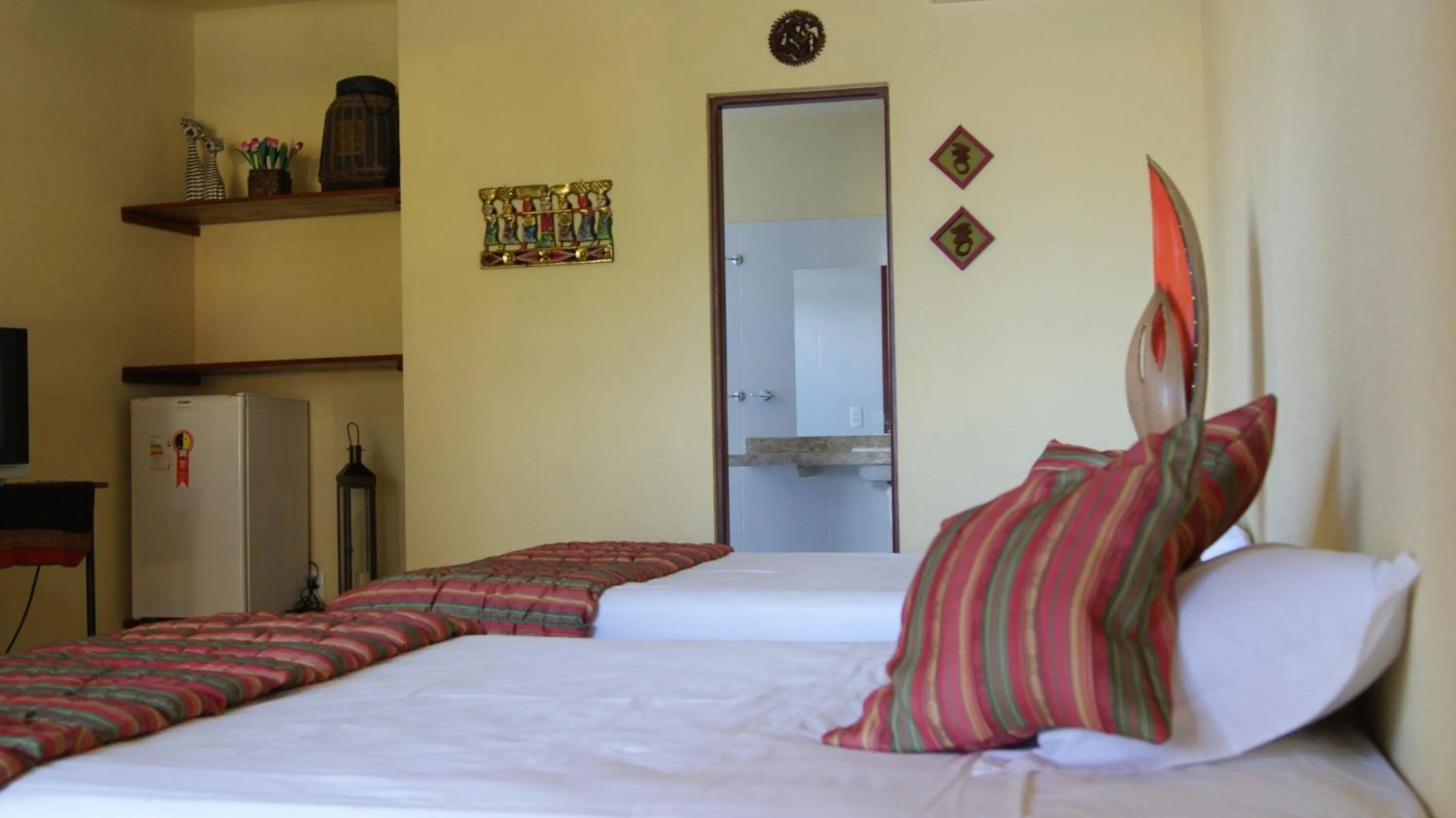 Bed in Pousada Cultural Canto dos Poetas