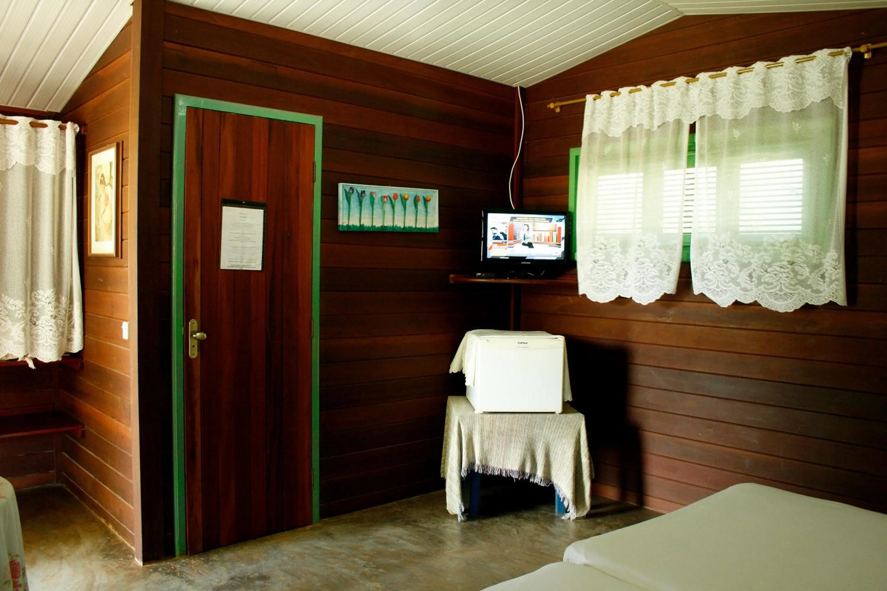 Bed in Pousada Cultural Canto dos Poetas