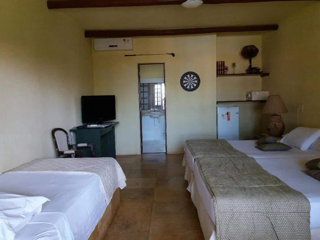 Bed in Pousada Cultural Canto dos Poetas