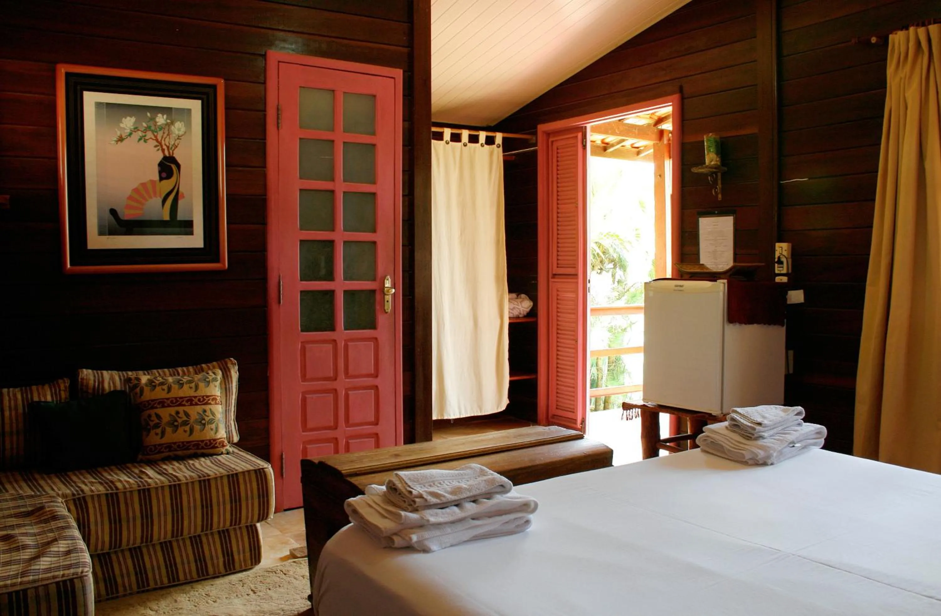 Bed in Pousada Cultural Canto dos Poetas