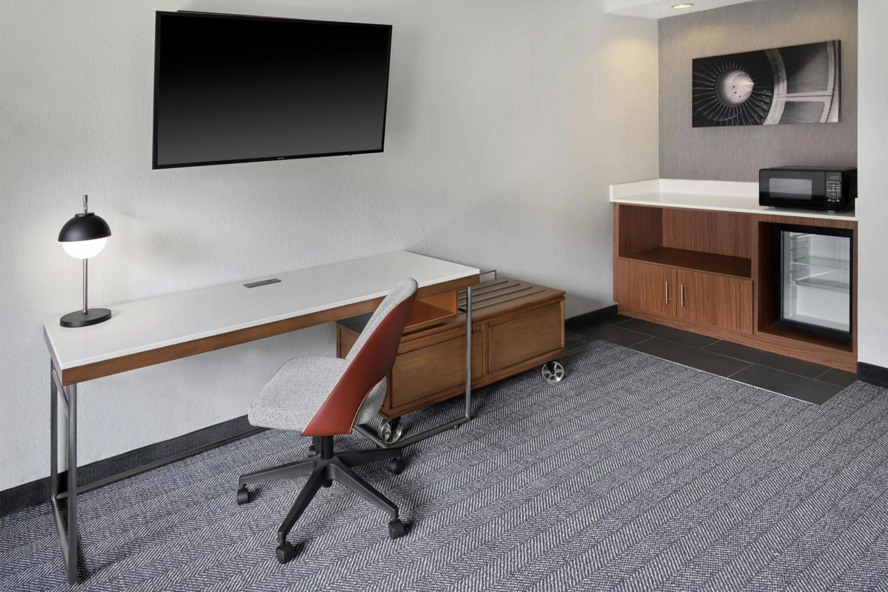 Living room in Courtyard by Marriott Huntsville University Drive