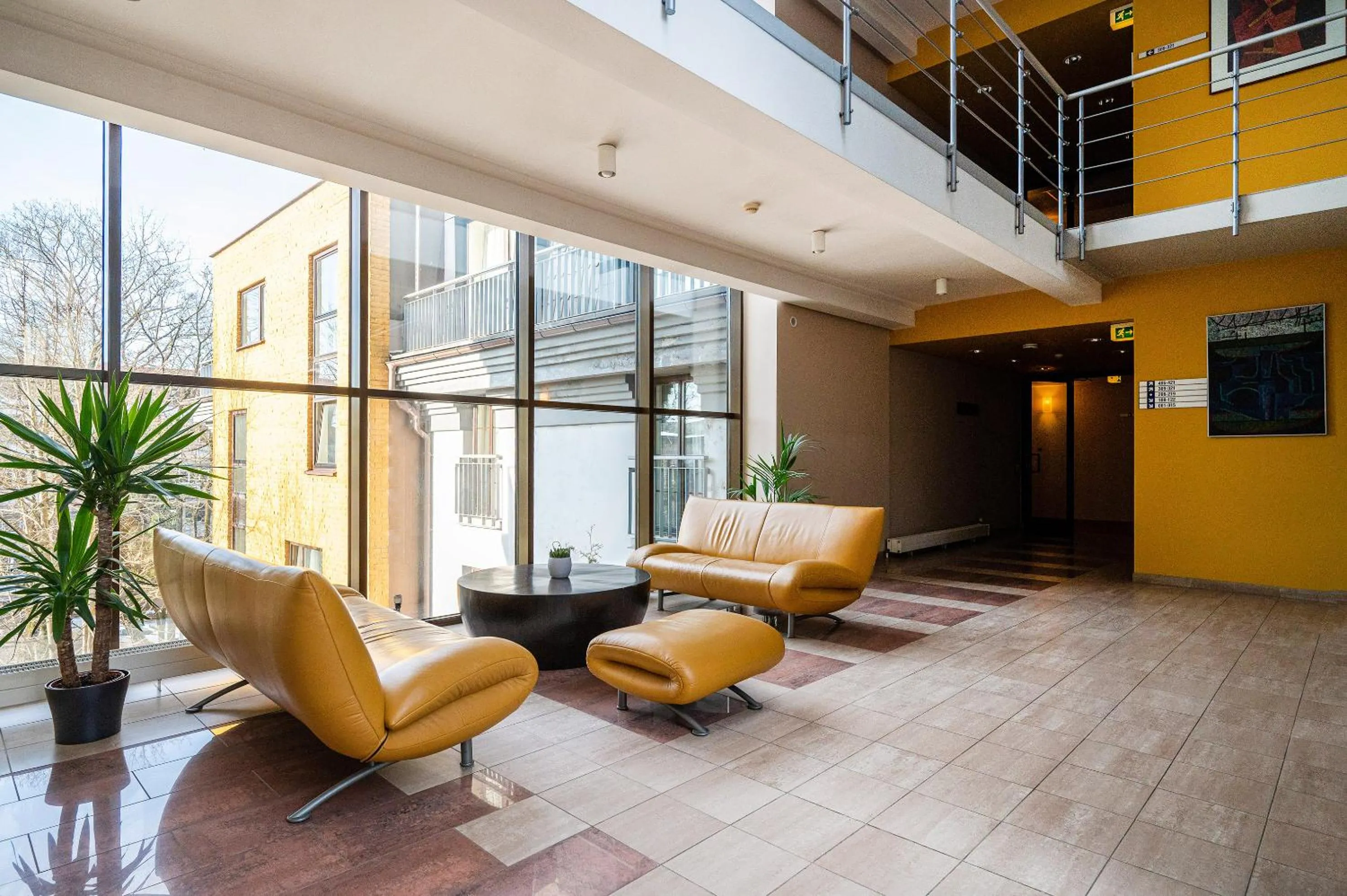 Seating area in Grata by Centrum Hotels