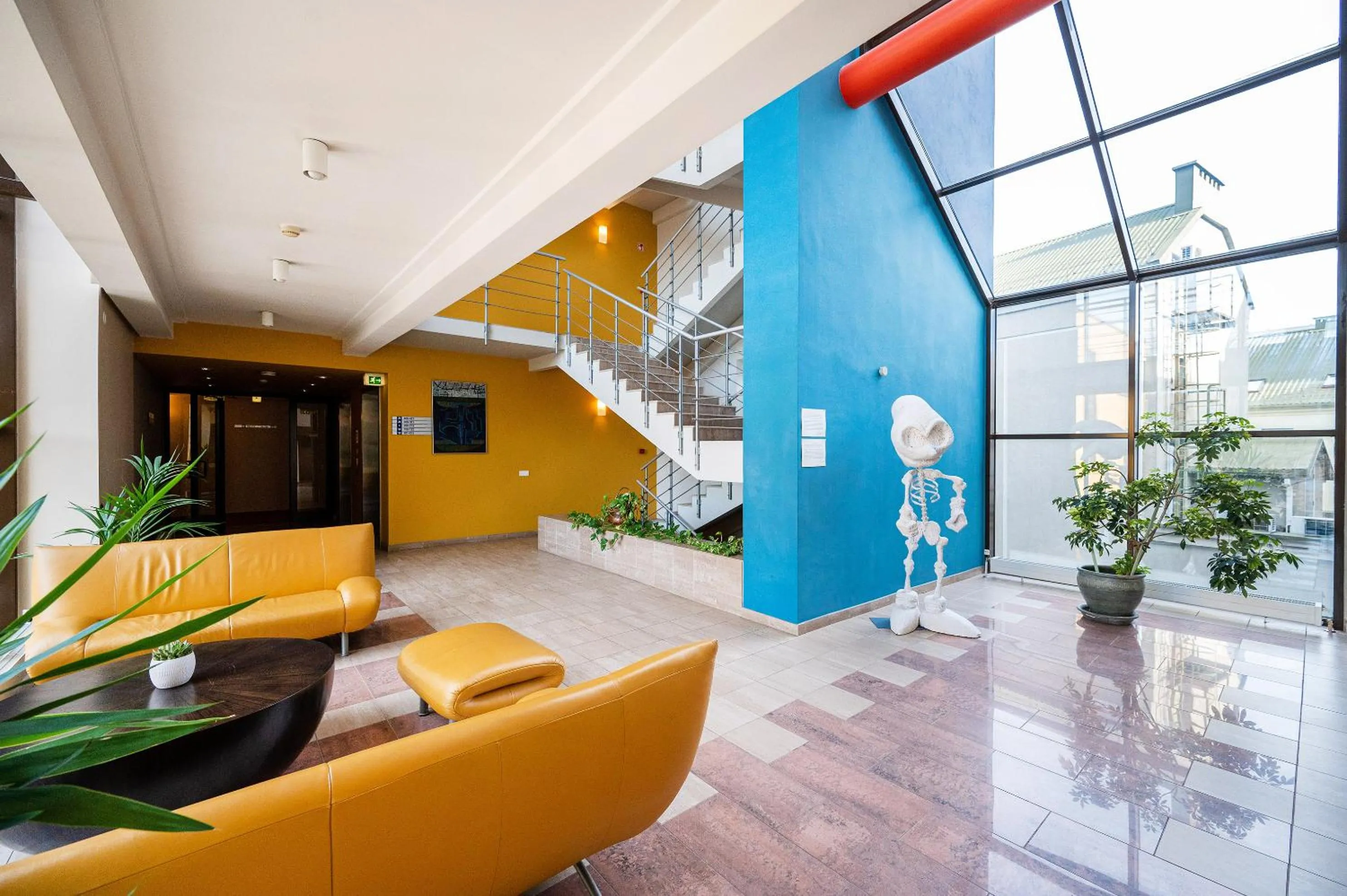 Seating area in Grata by Centrum Hotels