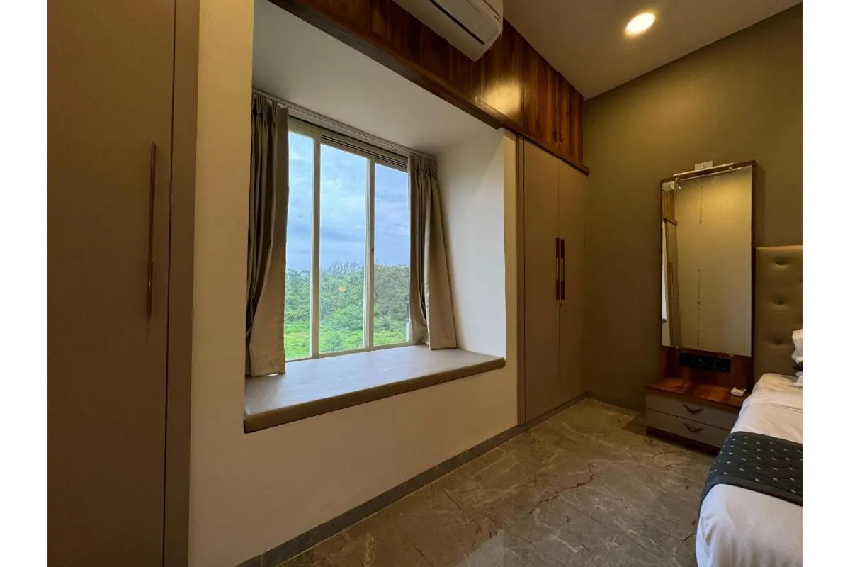 Bed in Hotel Sadhana Executive