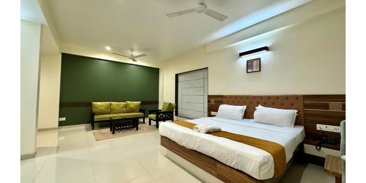 Bed in Hotel Sadhana Executive