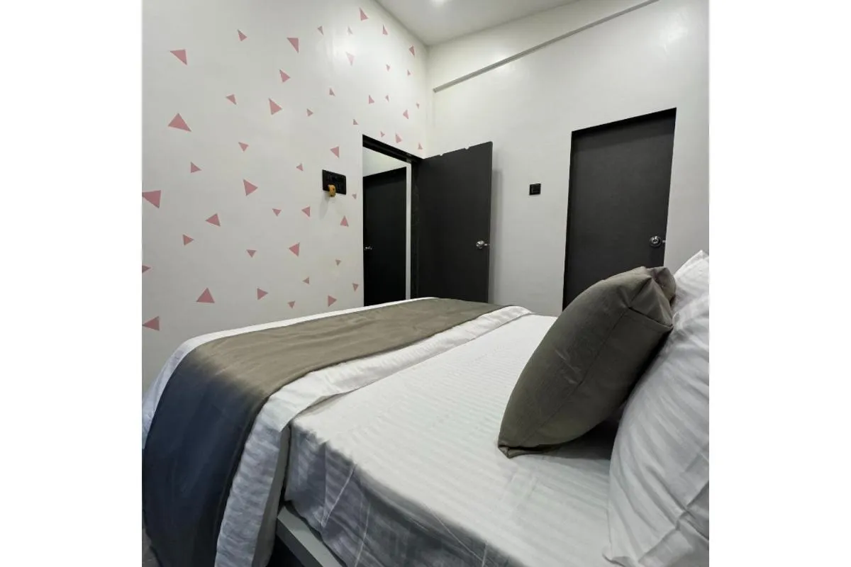 Bed in Hotel Sadhana Executive