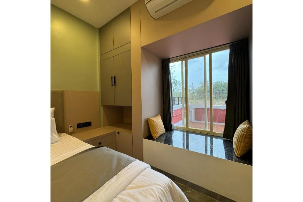 Bed in Hotel Sadhana Executive