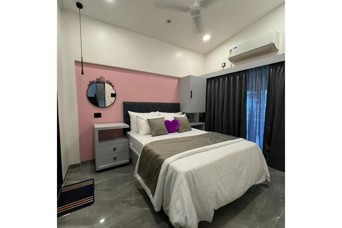 Bed in Hotel Sadhana Executive
