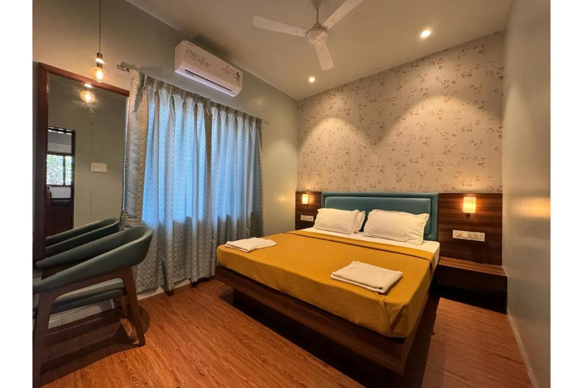 Bed in Hotel Sadhana Executive