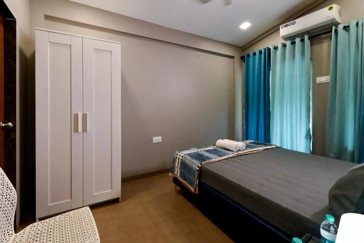 Bed in Hotel Sadhana Executive