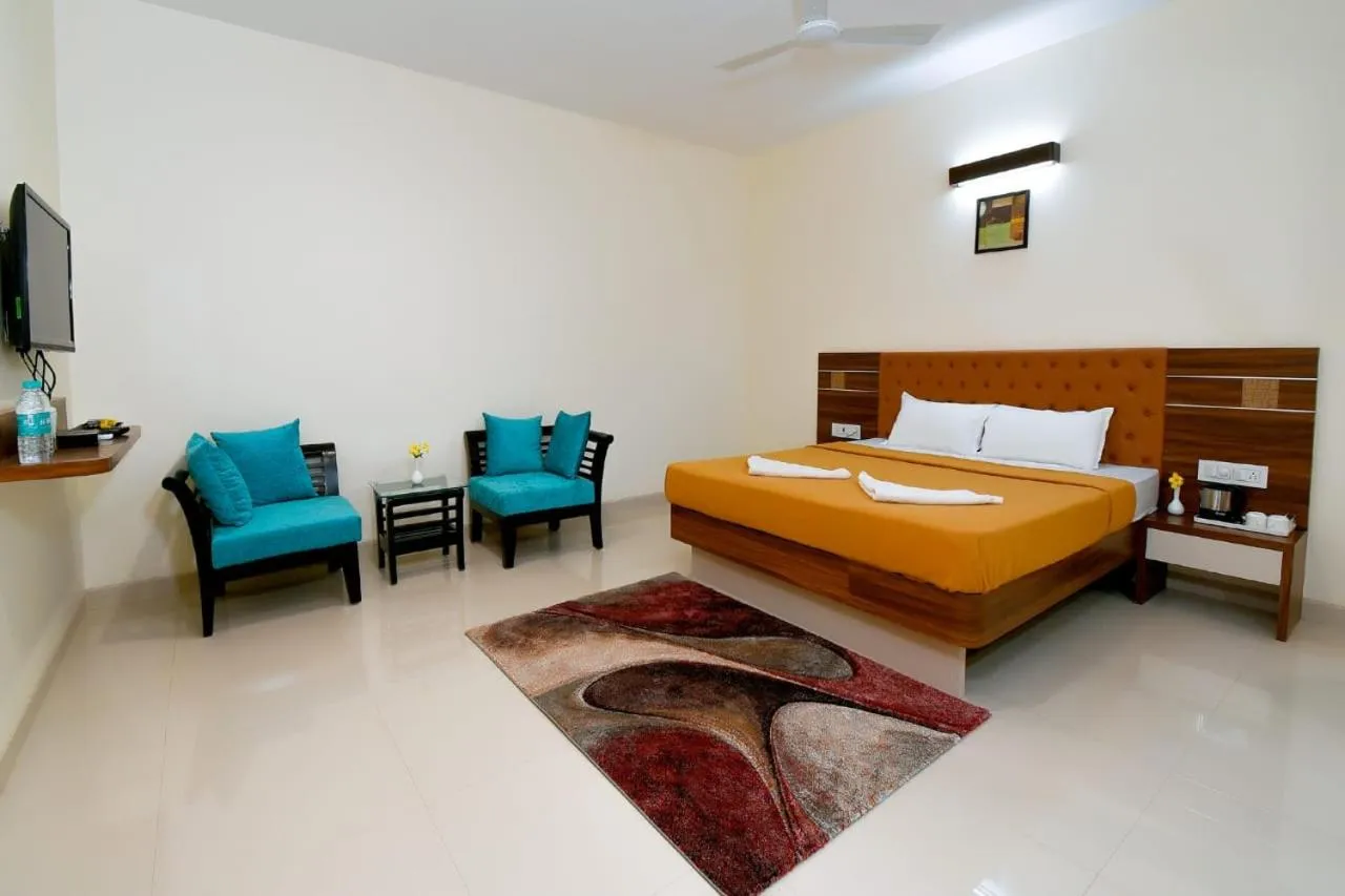 Bed in Hotel Sadhana Executive