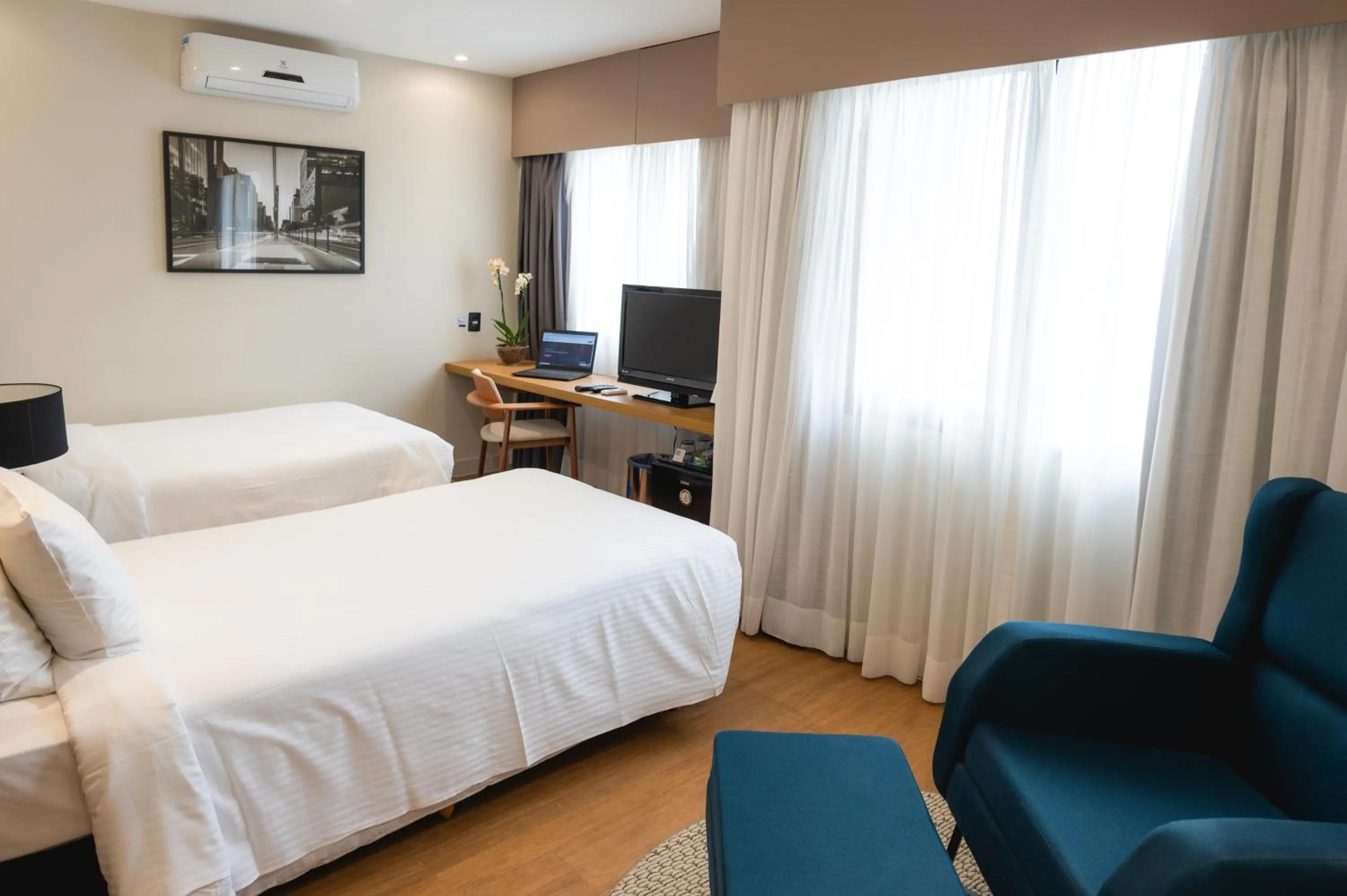 Bed in eSuítes Congonhas by Atlantica