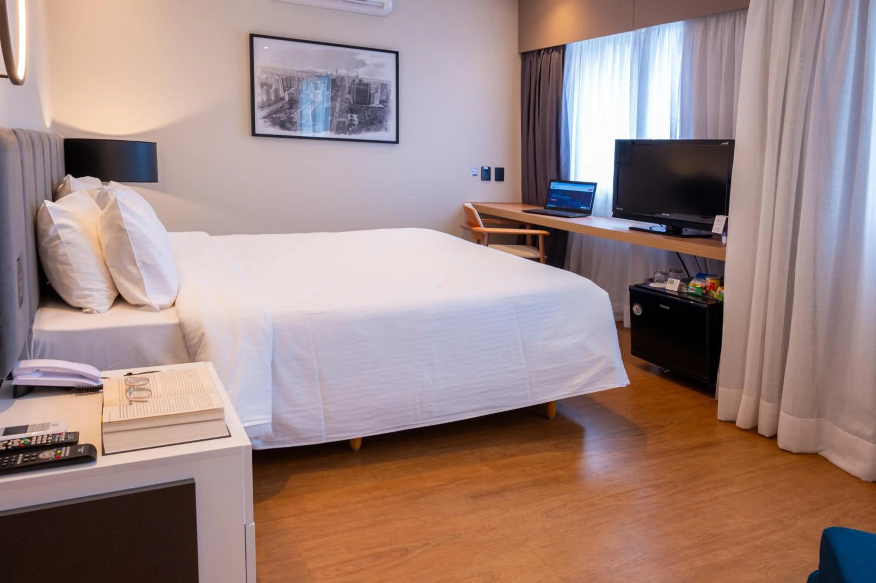 Bed in eSuítes Congonhas by Atlantica