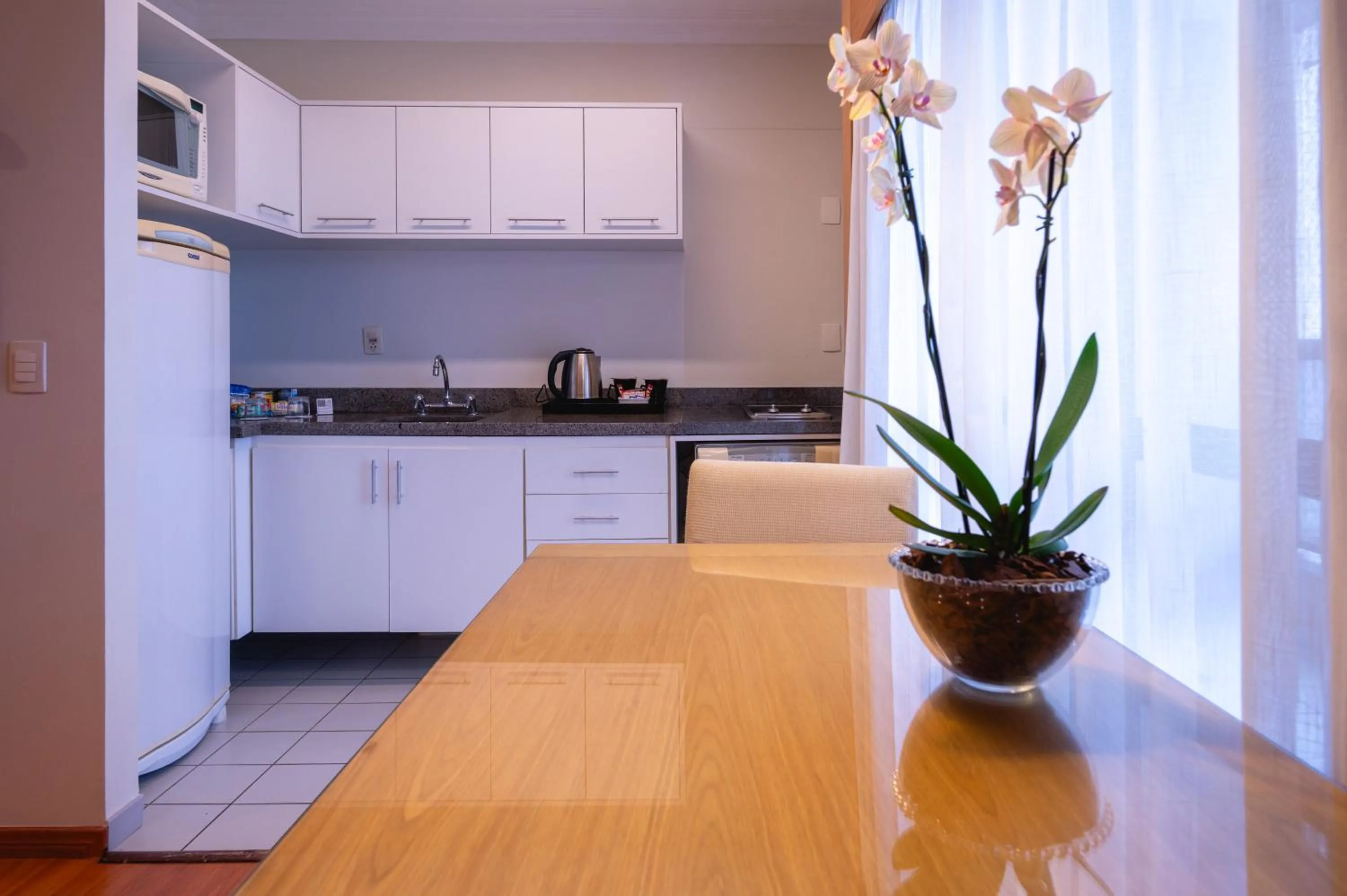 Kitchen or kitchenette in eSuítes Congonhas by Atlantica