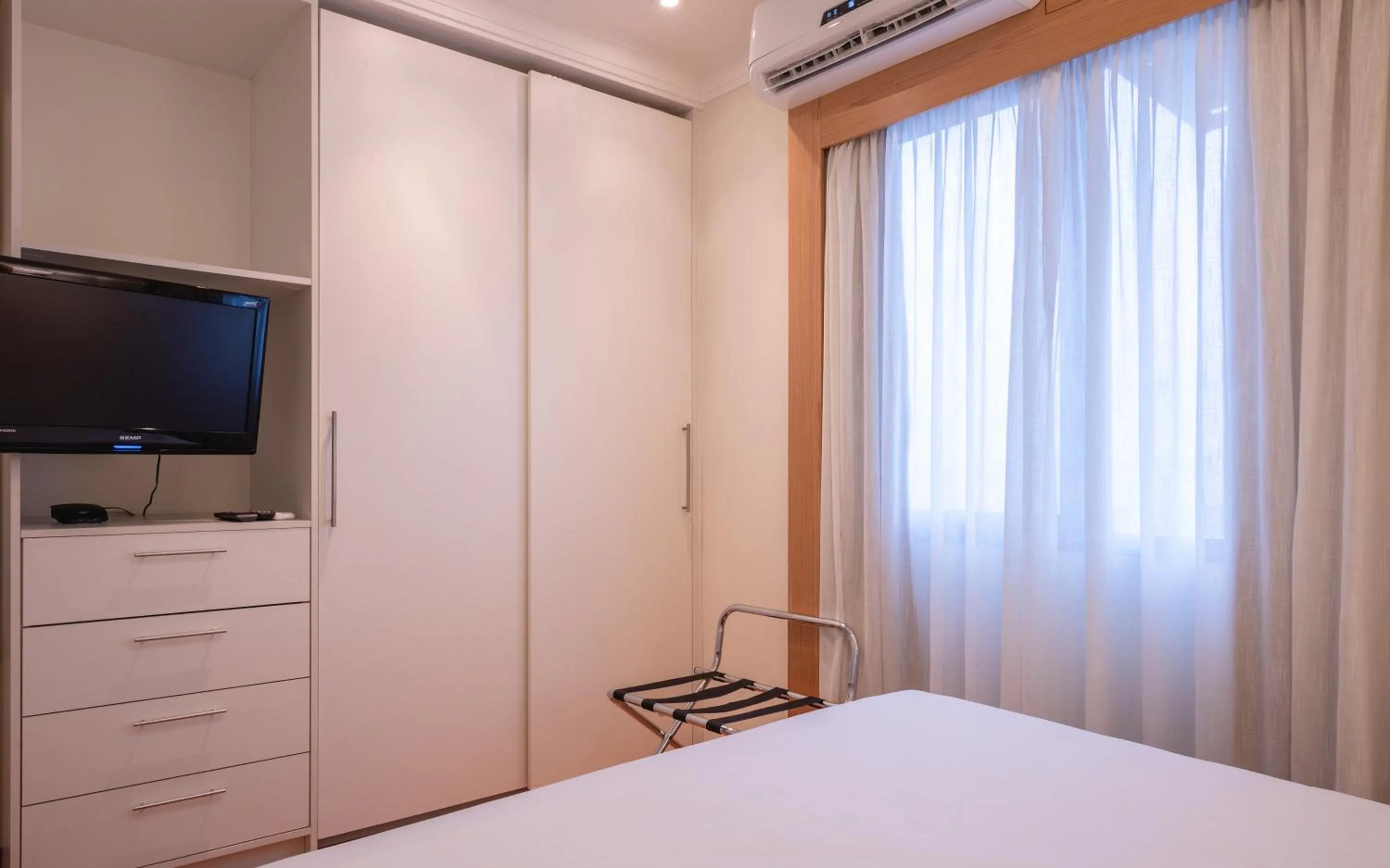 Bed in eSuítes Congonhas by Atlantica