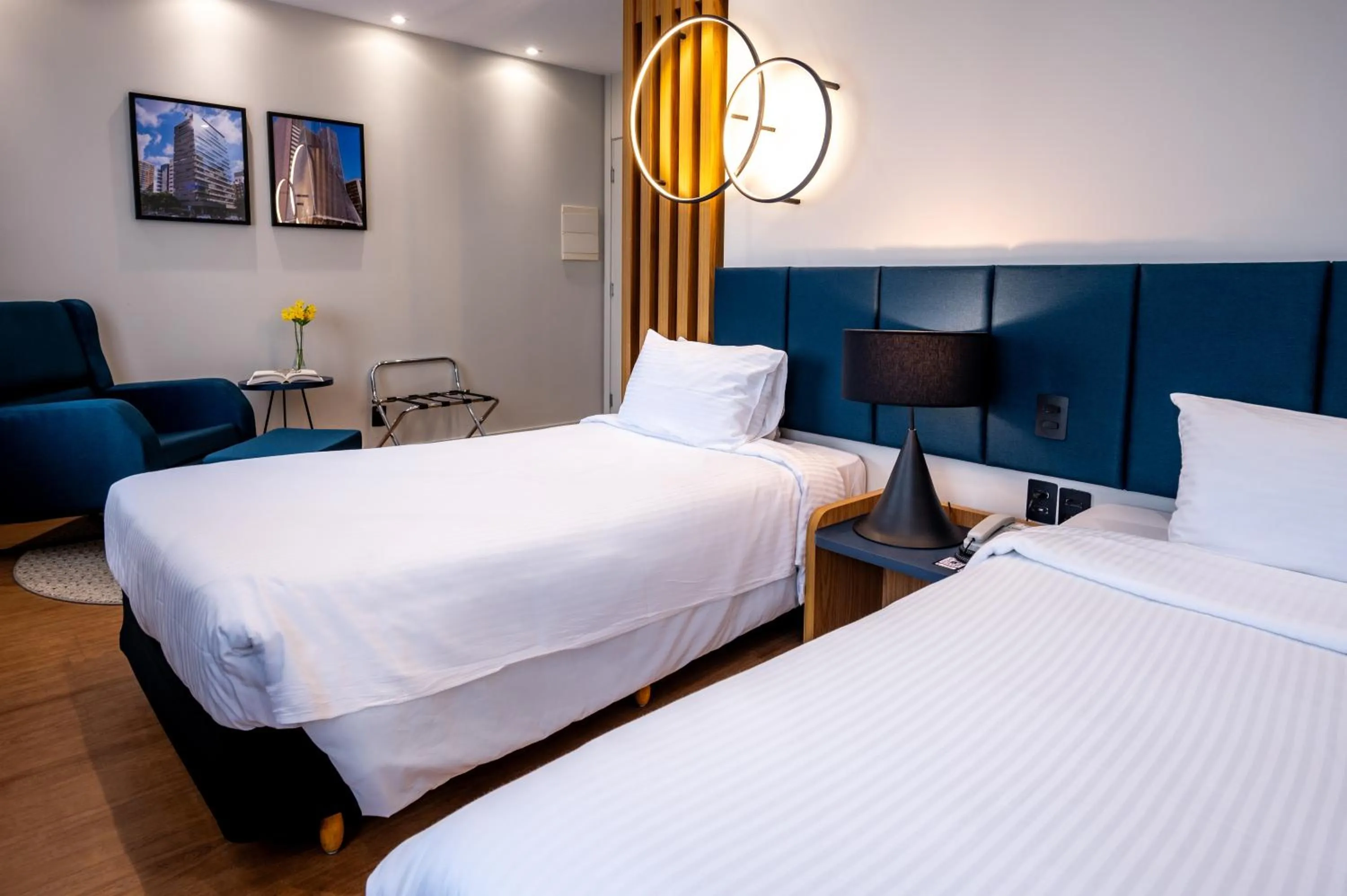 Bed in eSuítes Congonhas by Atlantica