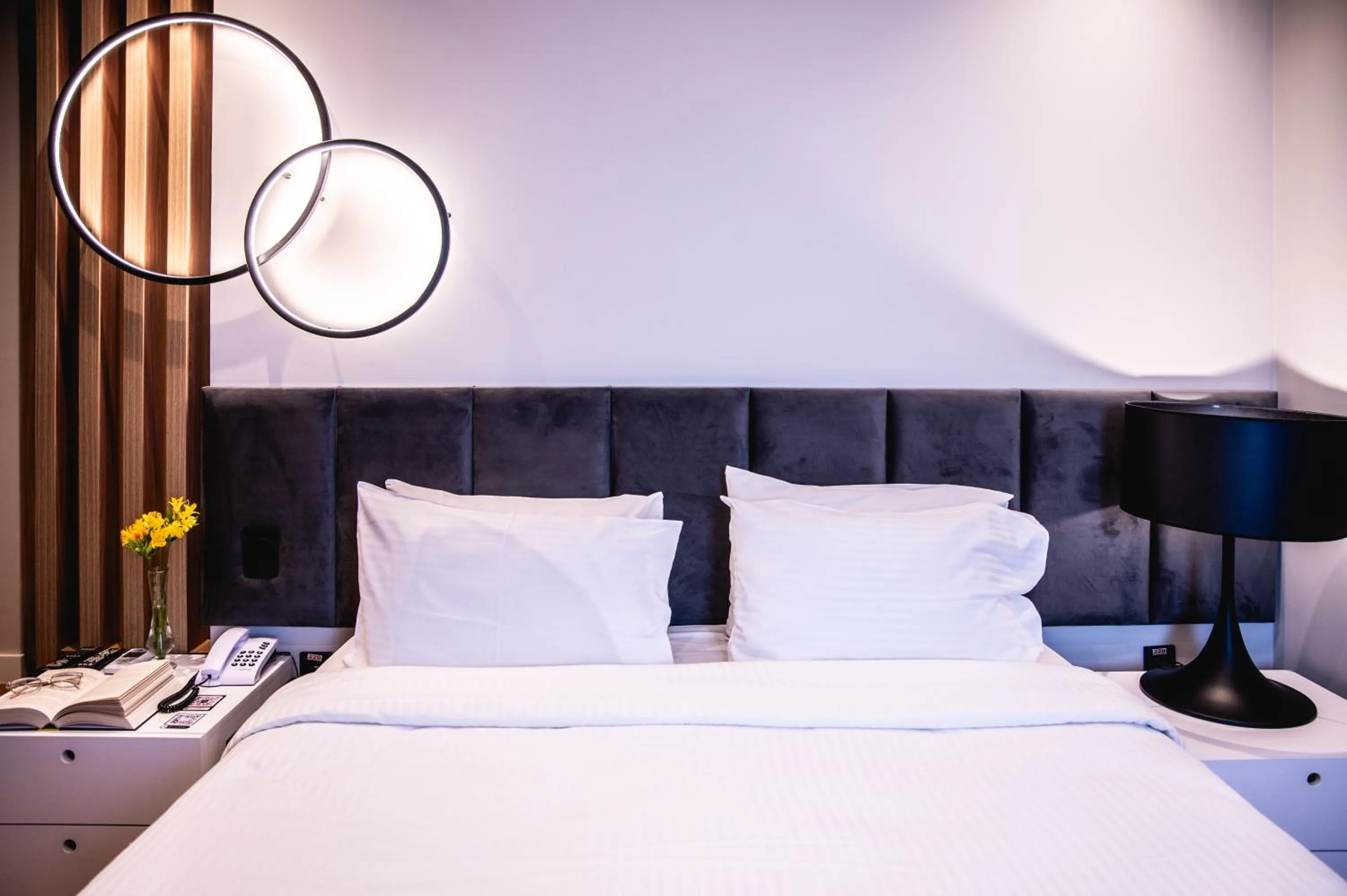 Bed in eSuítes Congonhas by Atlantica