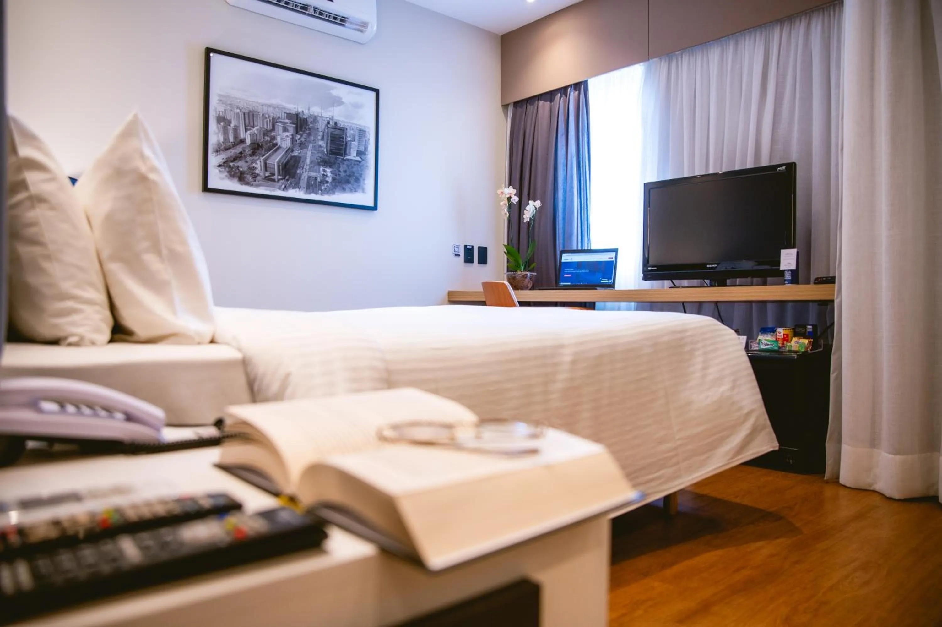 Bed in eSuítes Congonhas by Atlantica