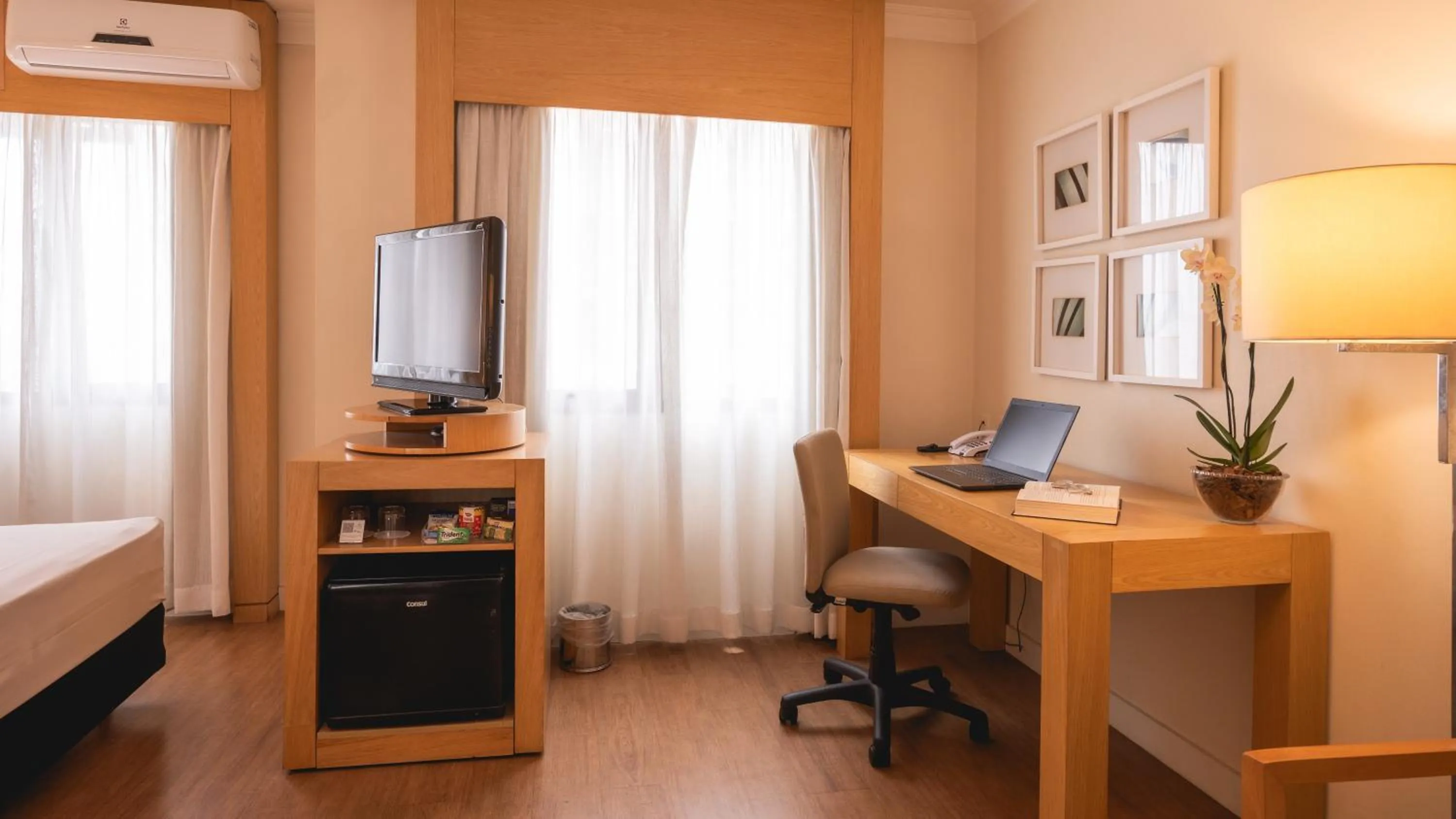 Bed in eSuítes Congonhas by Atlantica