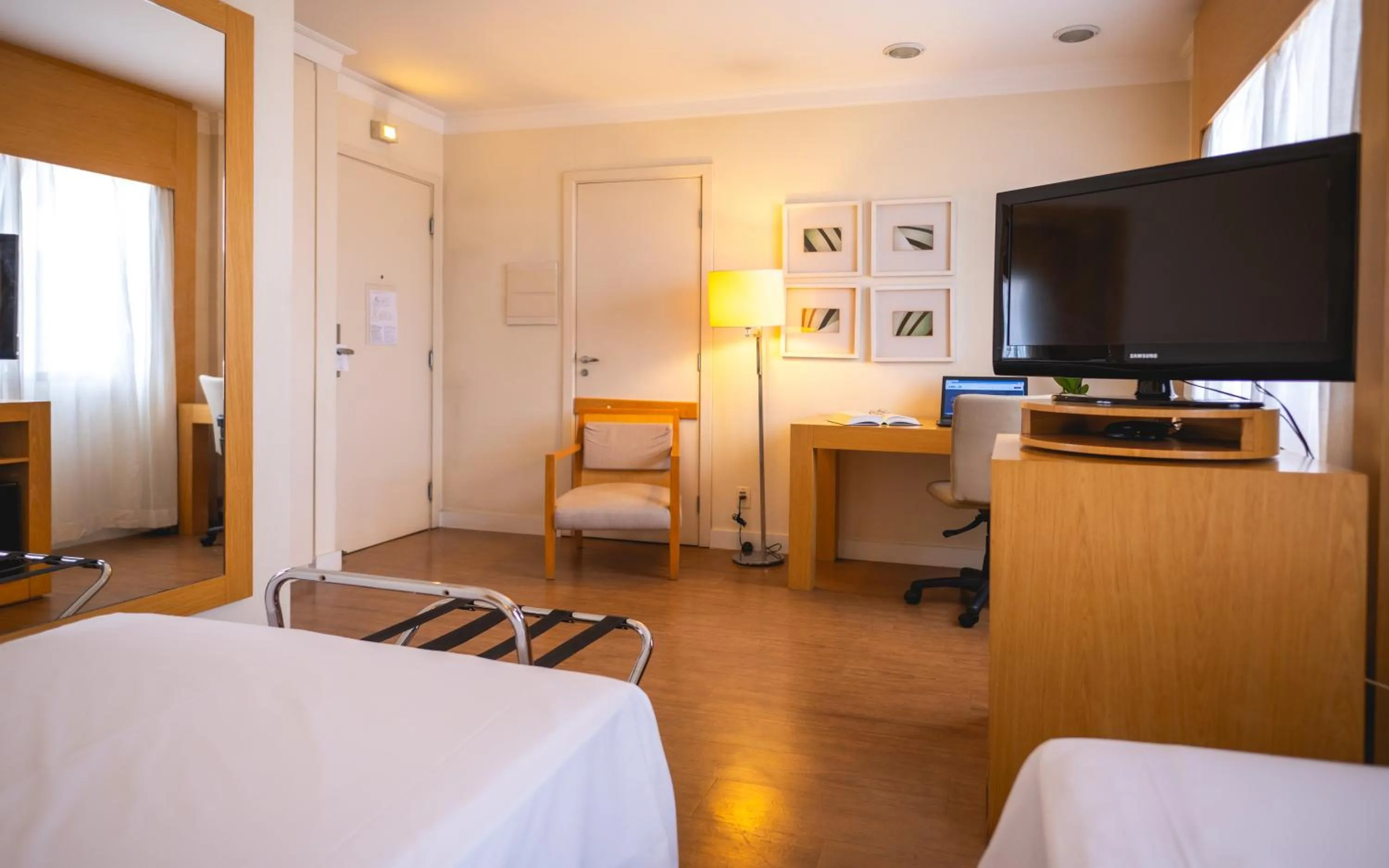 Bed in eSuítes Congonhas by Atlantica