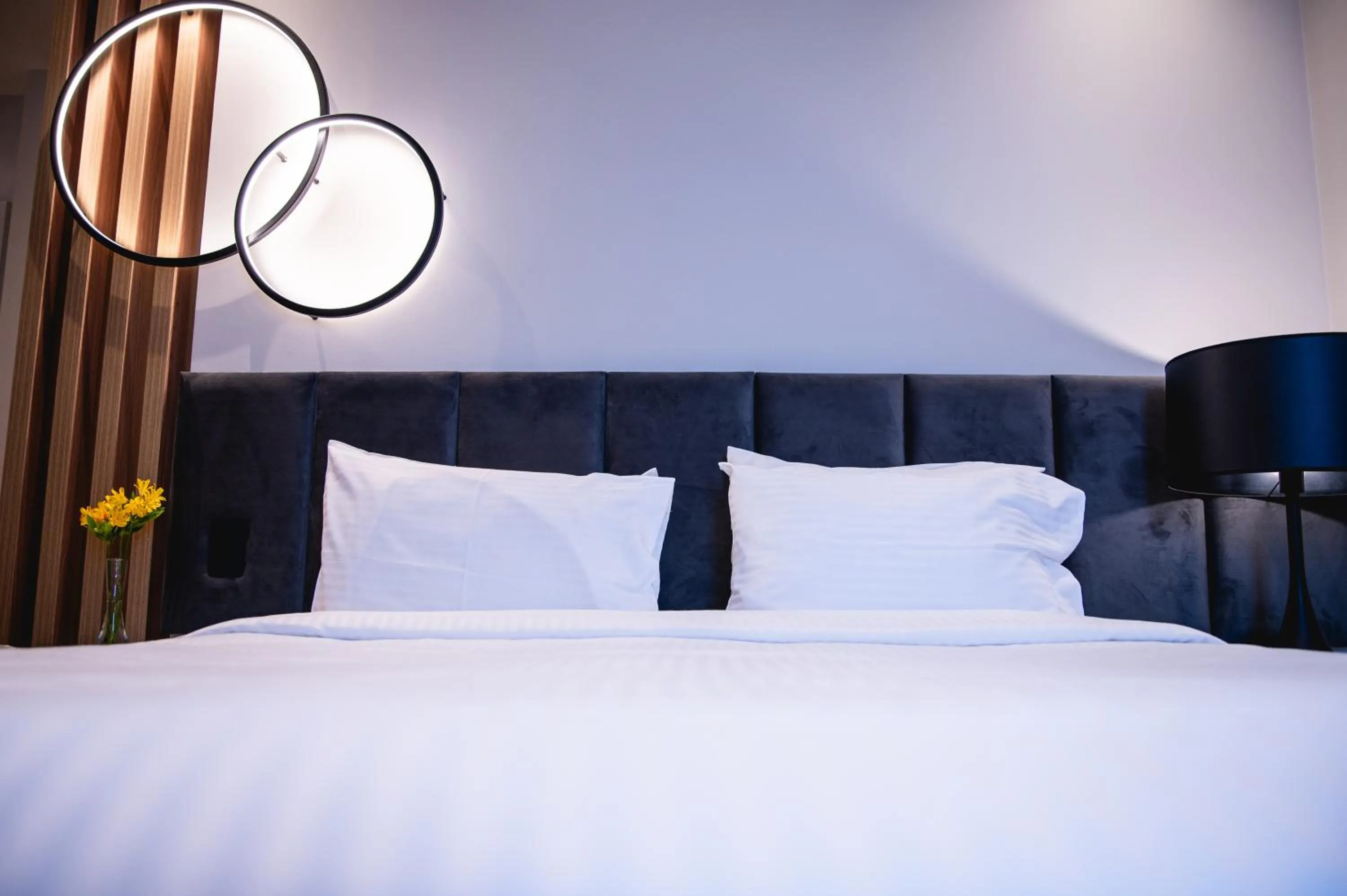 Bed in eSuítes Congonhas by Atlantica