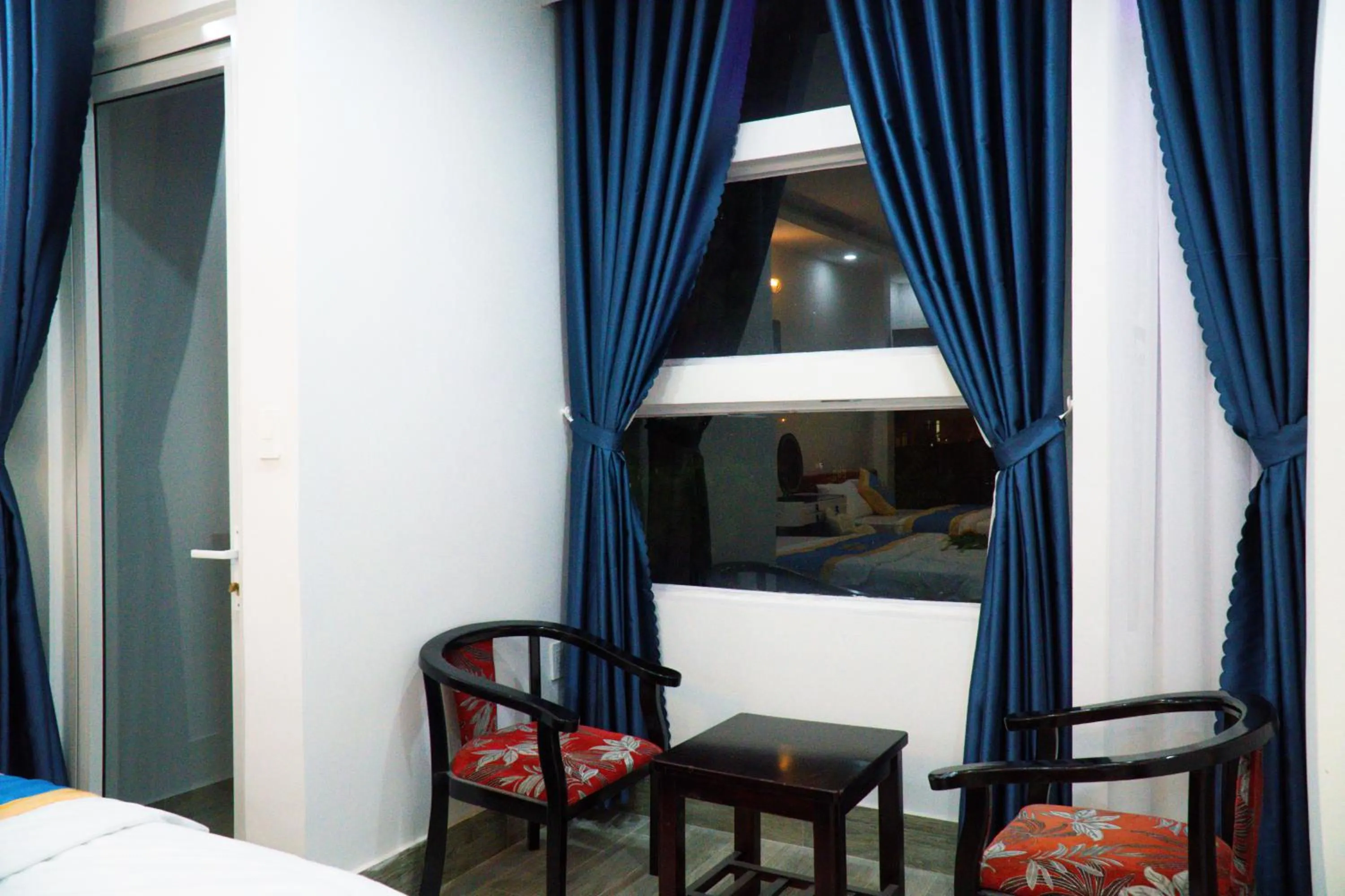 Seating area, Bed in Huong Mai Hotel