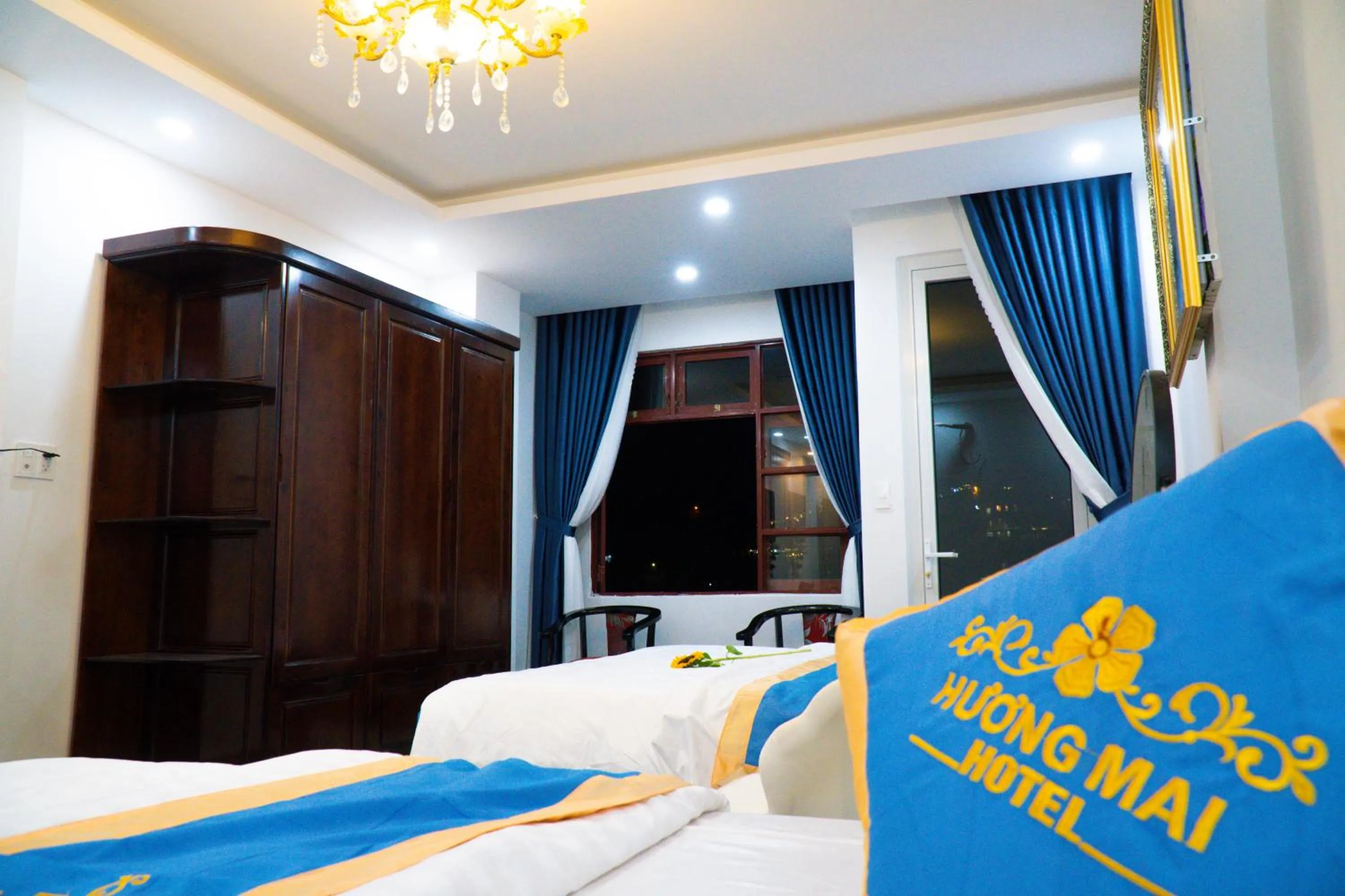 wardrobe, Bed in Huong Mai Hotel